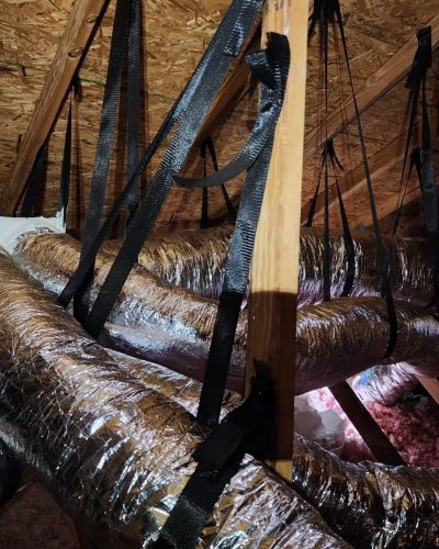 Attic Ducts Insulated And Suspended In Wood Structure Tampa Fl