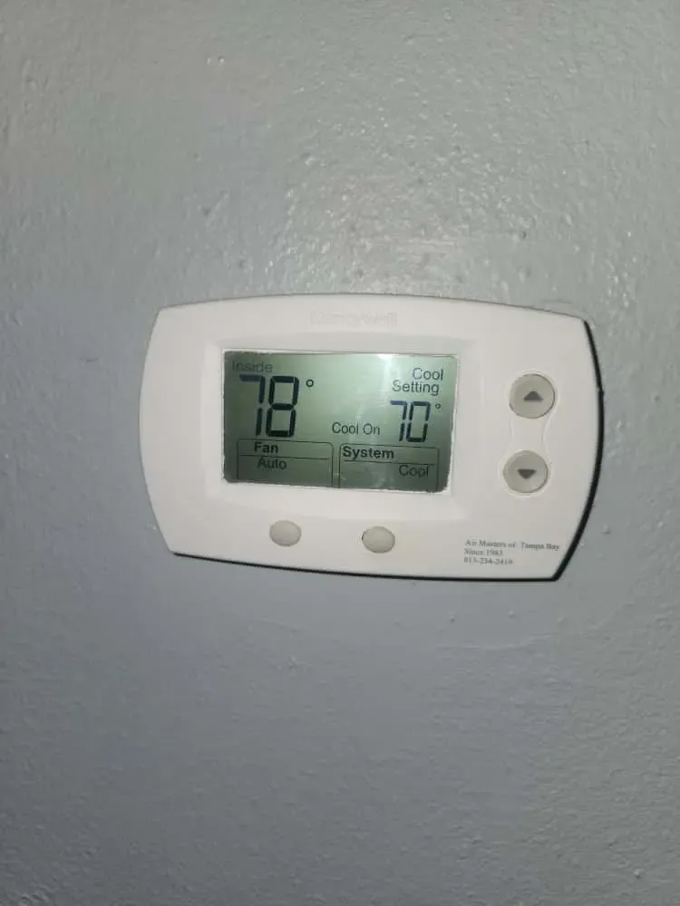 plumbing services being performed with drain cleaning equipment in a residential setting in tampa bay