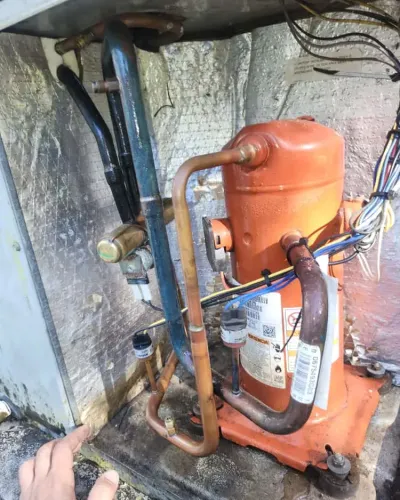 plumbing services including drain cleaning and water heater repairs being performed by home therapist cooling heating and plumbing in tampa