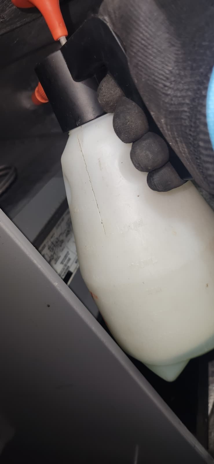 Technician reviewing blower wheel condition during Tampa, FL 33634 HVAC check