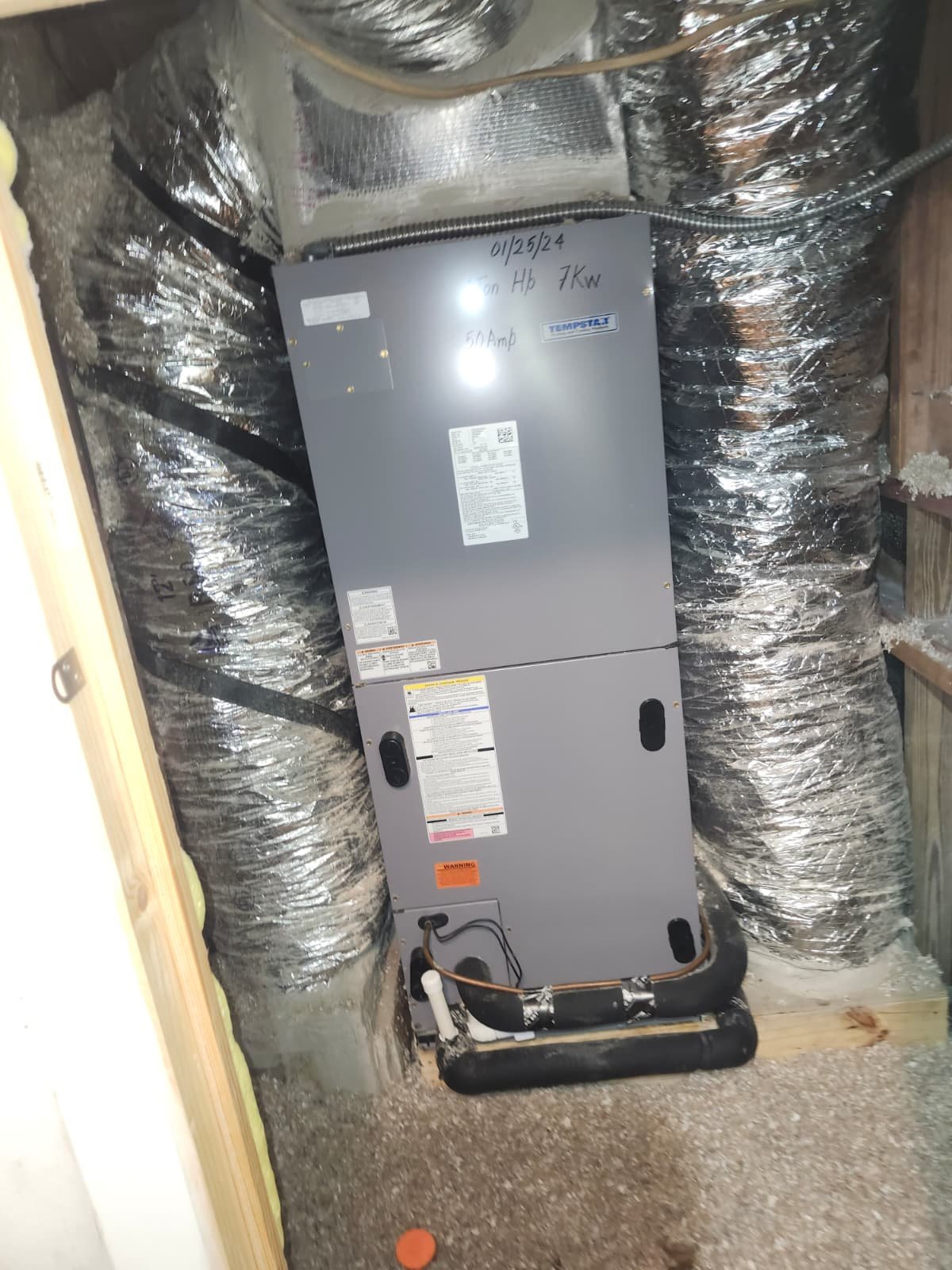 AC maintenance on premium plan in Tampa, FL 33615 inspecting air handler