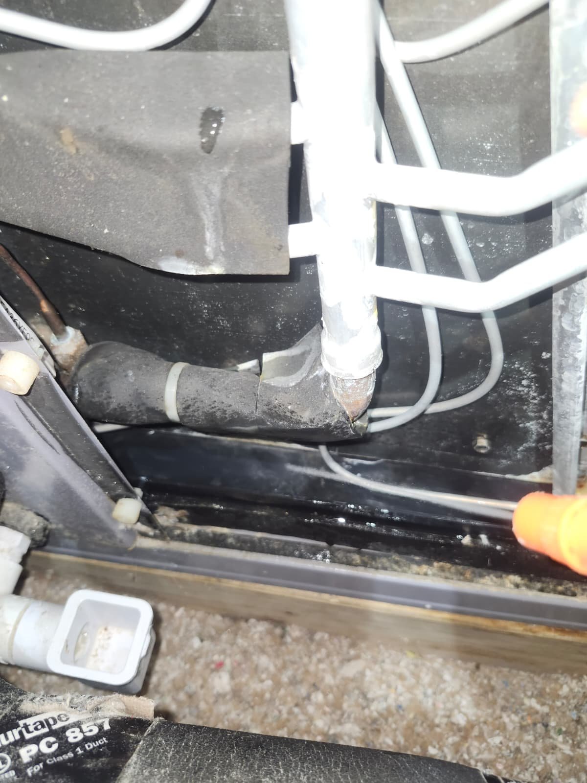 Tampa, FL 33615 AC maintenance tech reviewing blower area for UV light option