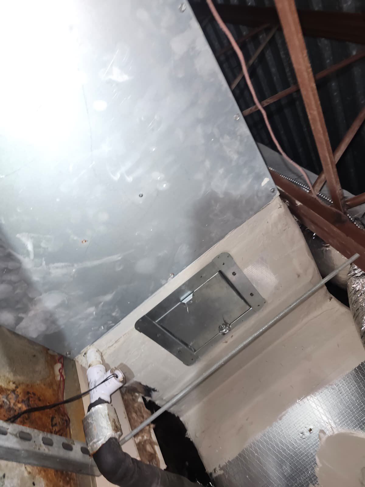 Rust on HVAC evaporator coil during maintenance Palm Harbor, FL 34684