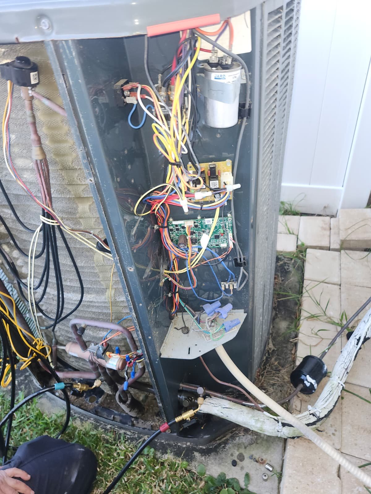 Condenser contactor replacement during HVAC repair in Tarpon Springs, FL