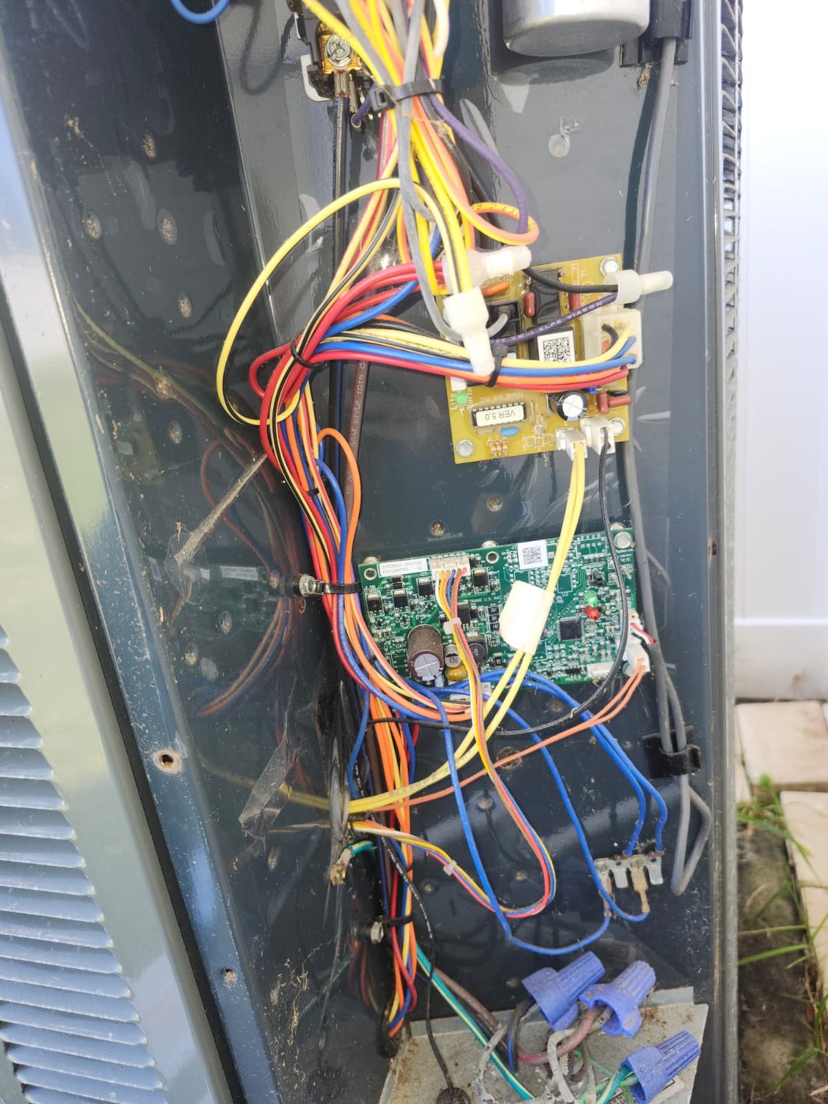 Closeup of replaced air handler transformer and fuse in Tarpon Springs, Florida