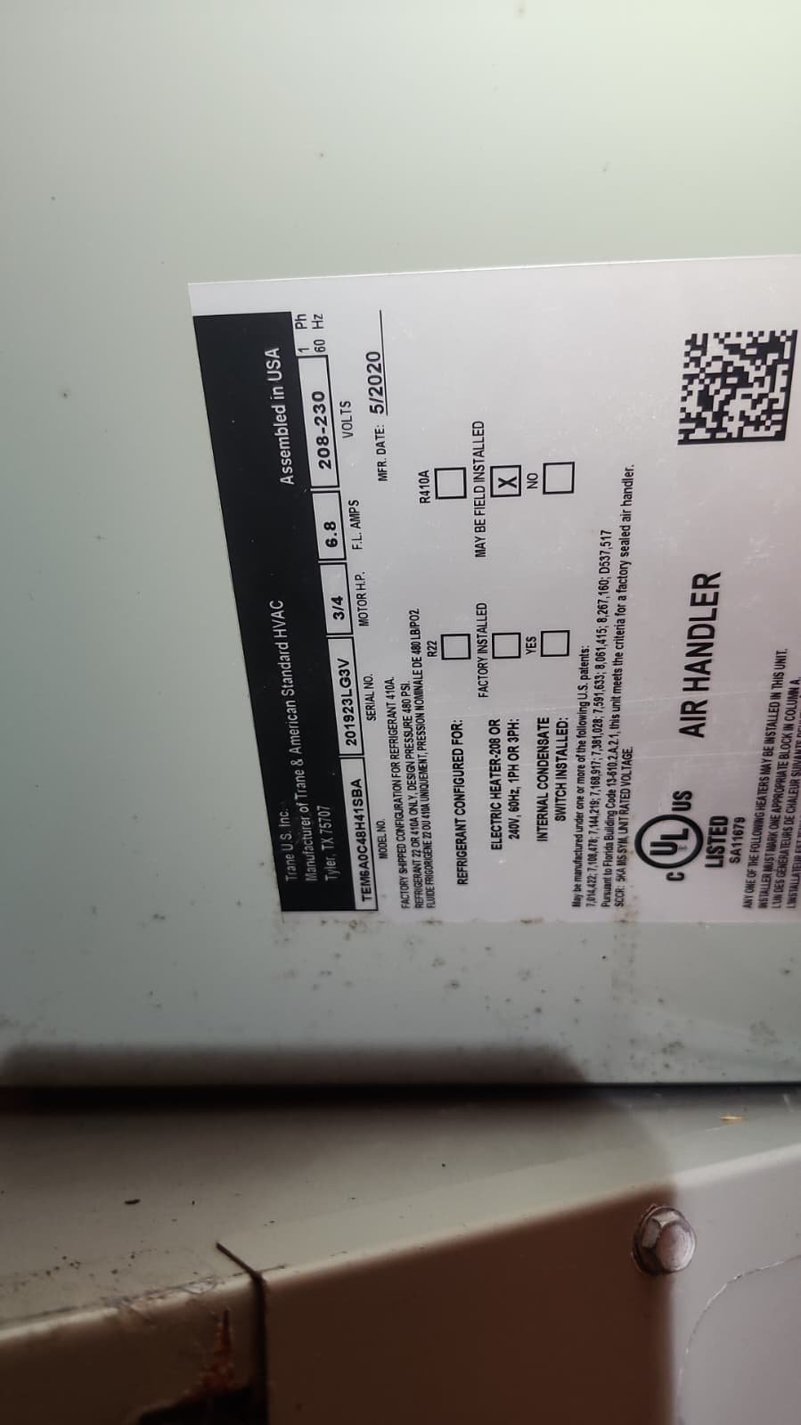 Hurricane-ready Daikin condenser on concrete pad in Tarpon Springs, FL 34689