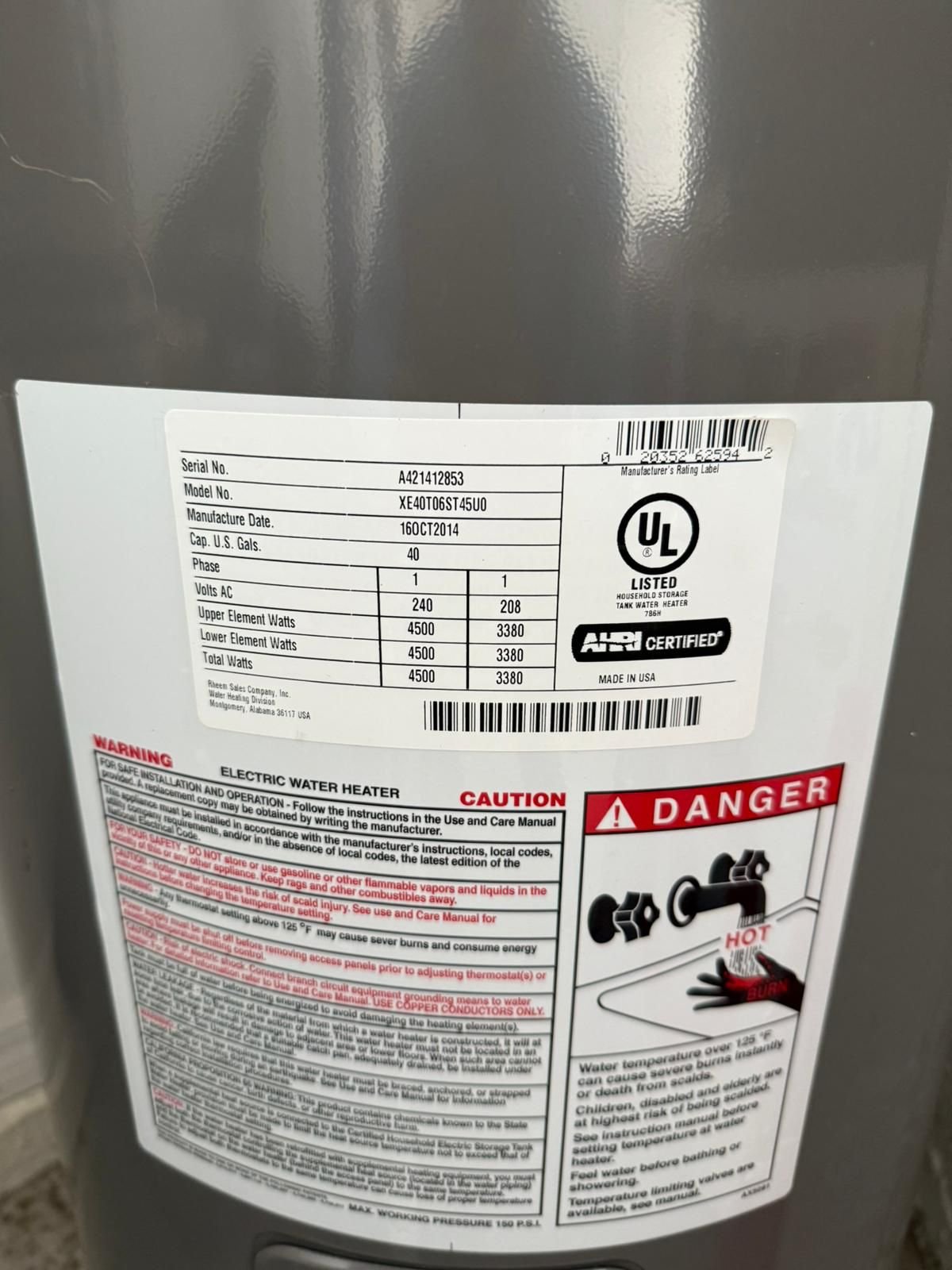 New Rheem tall electric water heater setup during install in Riverview, FL 33579
