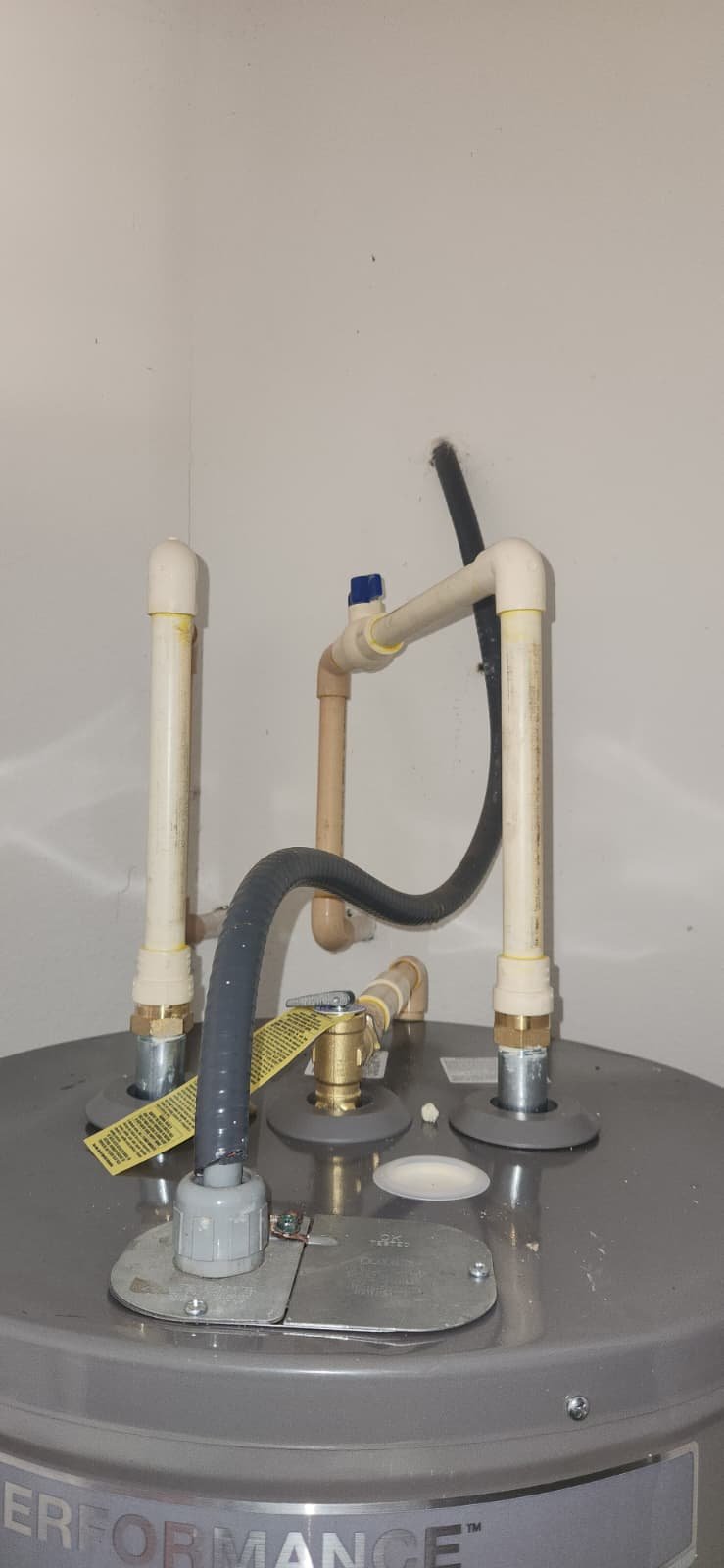 Installed 50 gallon Rheem water heater with drain pan in Riverview, FL 33579 garage