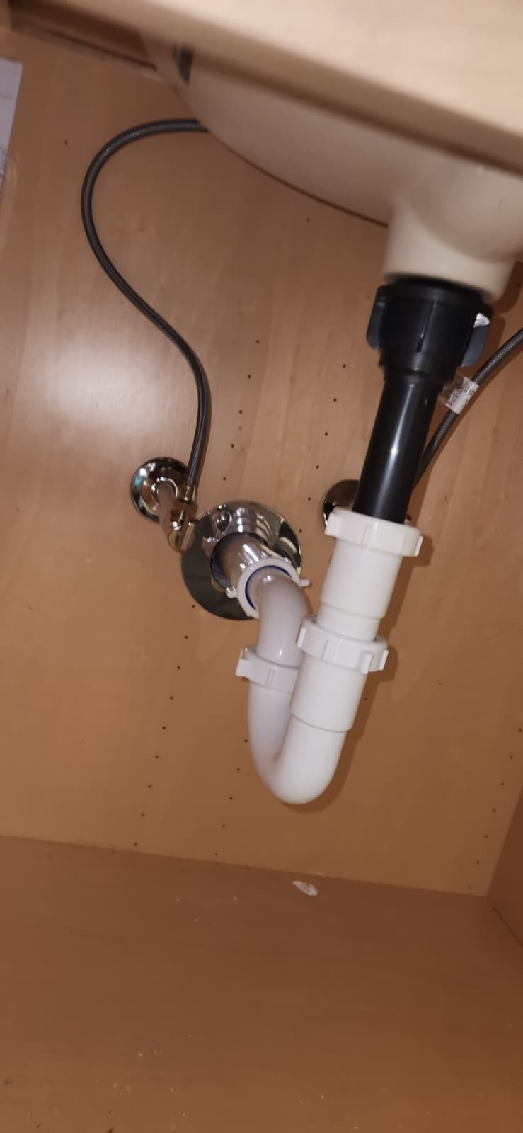 Completed sink drain and p-trap repair under cabinet in Lutz, FL 33559