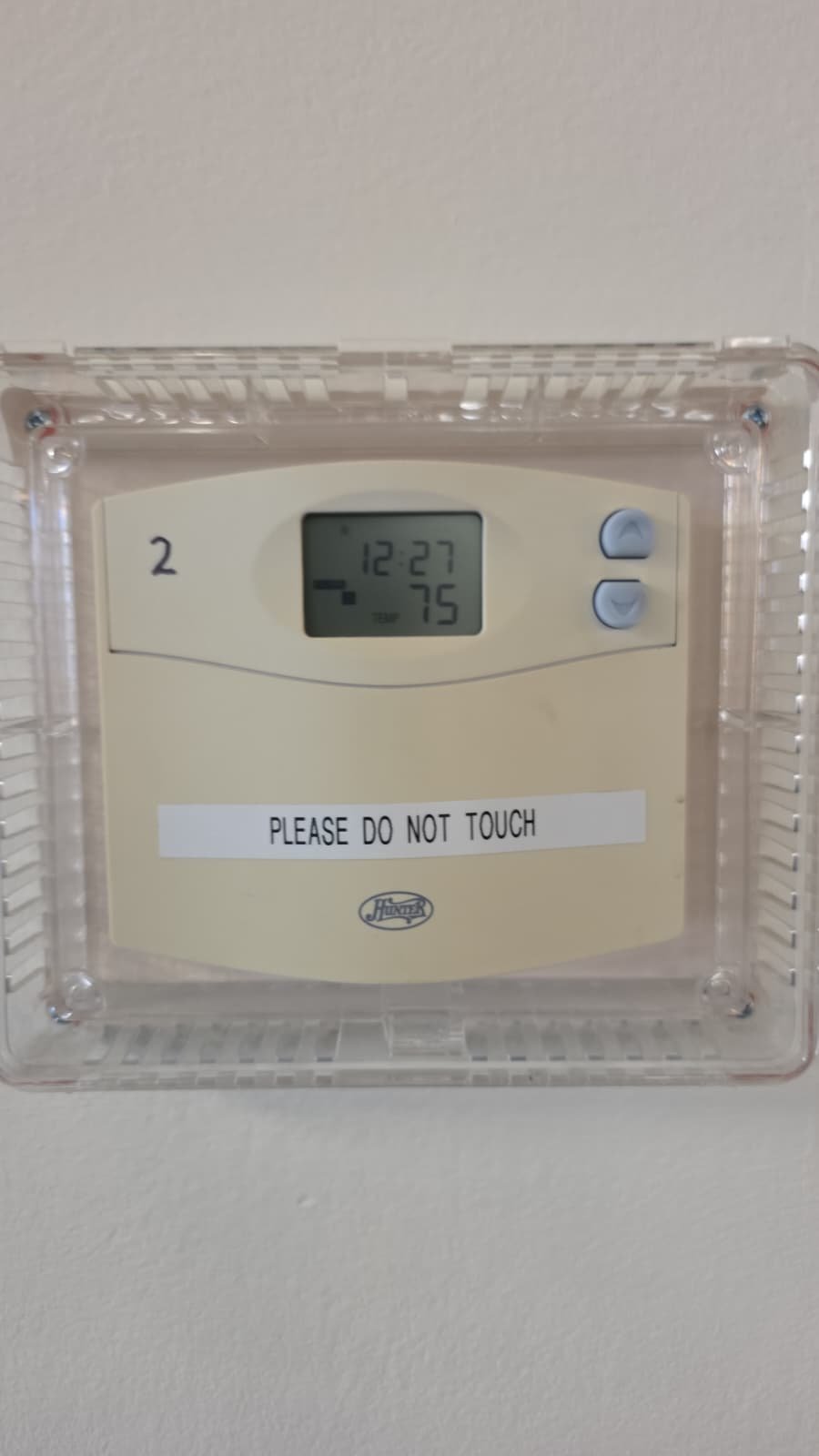 Pro Care plan technician verifying HVAC system operation in Tampa, FL 33634