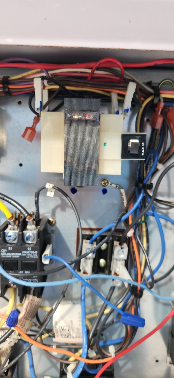 Air handler electrical panel open during relay replacement in Riverview, FL 33578