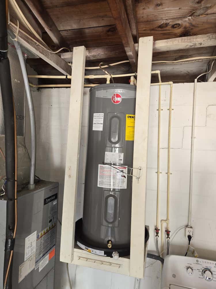 Detail of Rheem 40 gallon electric water heater connections in St. Petersburg, FL 33703