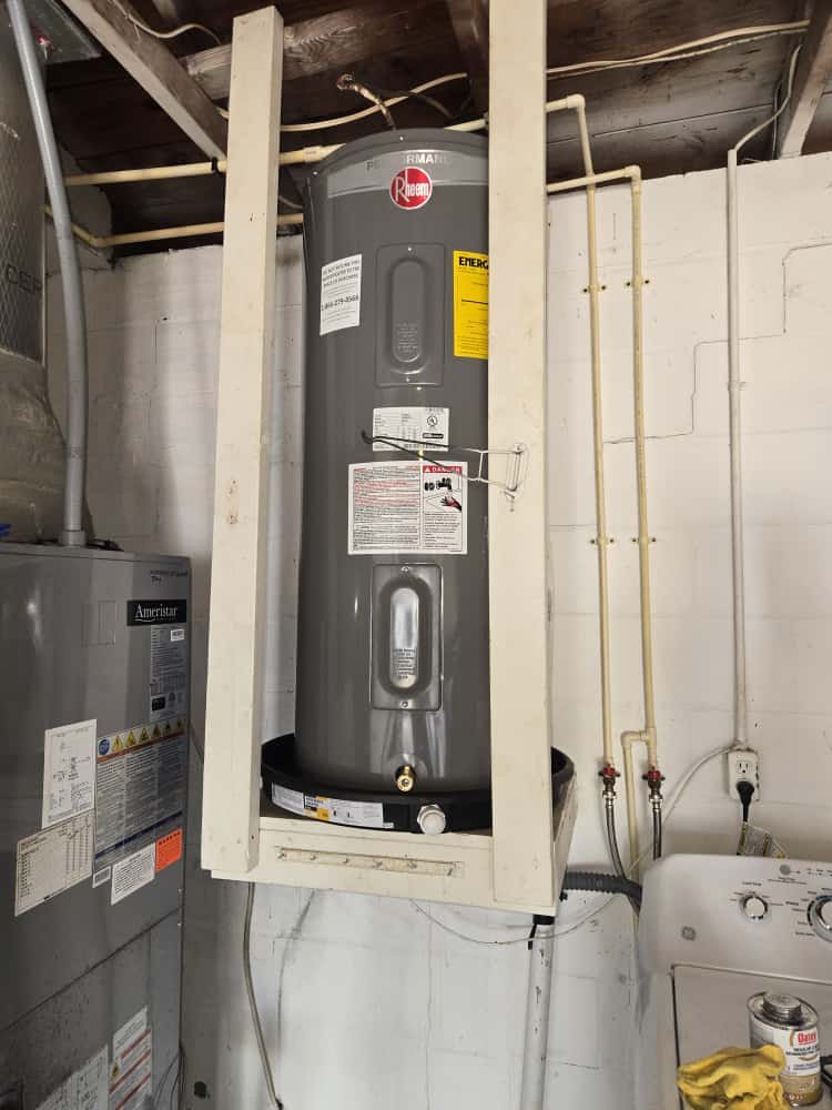 New Rheem tall 40 gallon water heater setup in St. Petersburg, FL 33703 garage