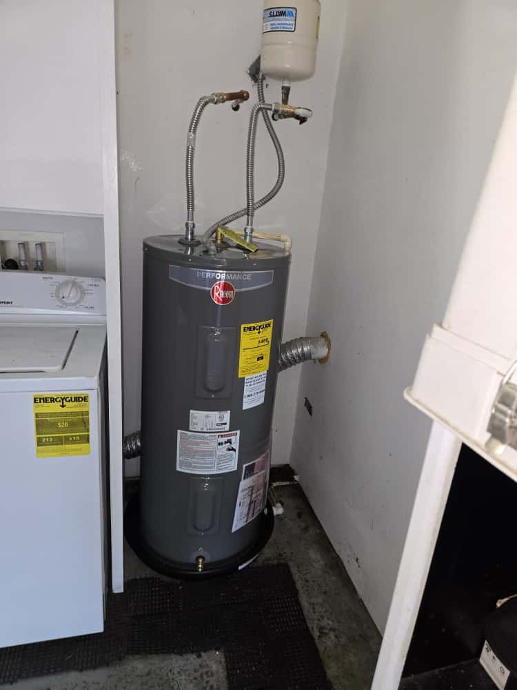 Customer supplied water heater set in drain pan in St. Petersburg, FL 33703