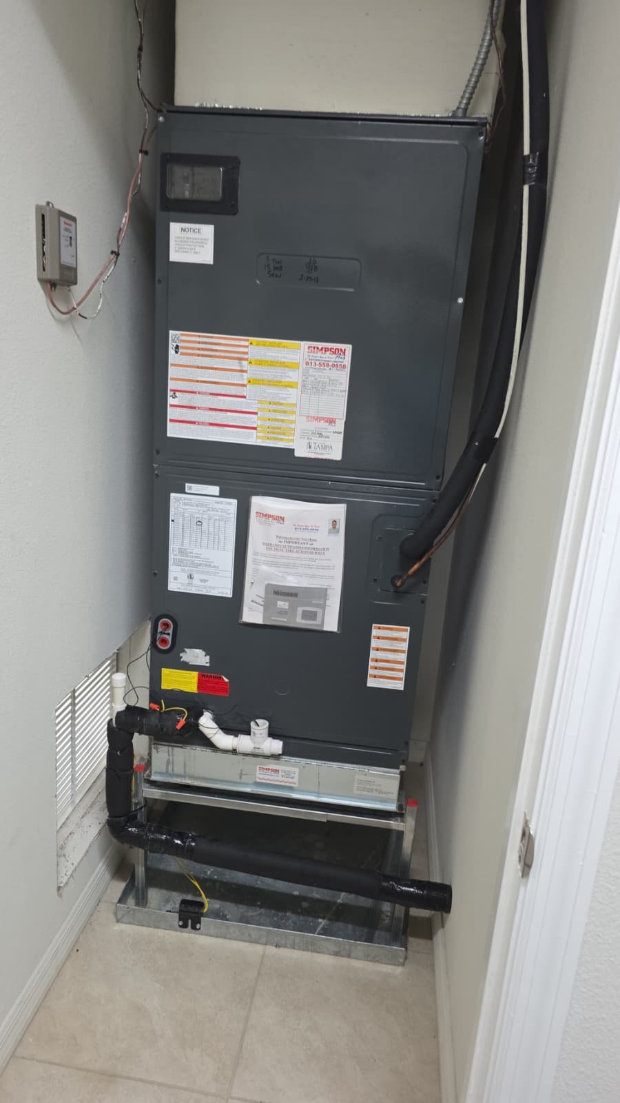 Checking AC system pressures during maintenance visit in Riverview, FL 33579