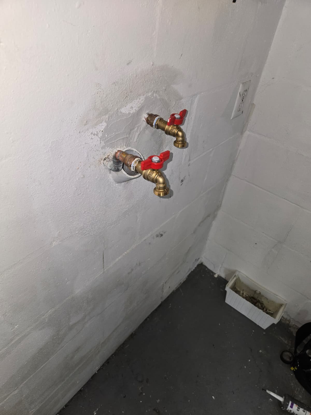 Completed hose bib and wall opening at Tampa, FL 33618 residence