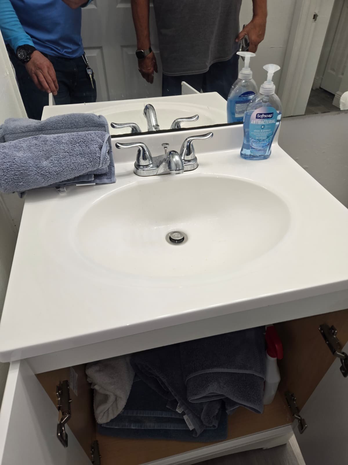 Leaking plumbing fittings checked during water heater inspection in Palm Harbor, FL 34683