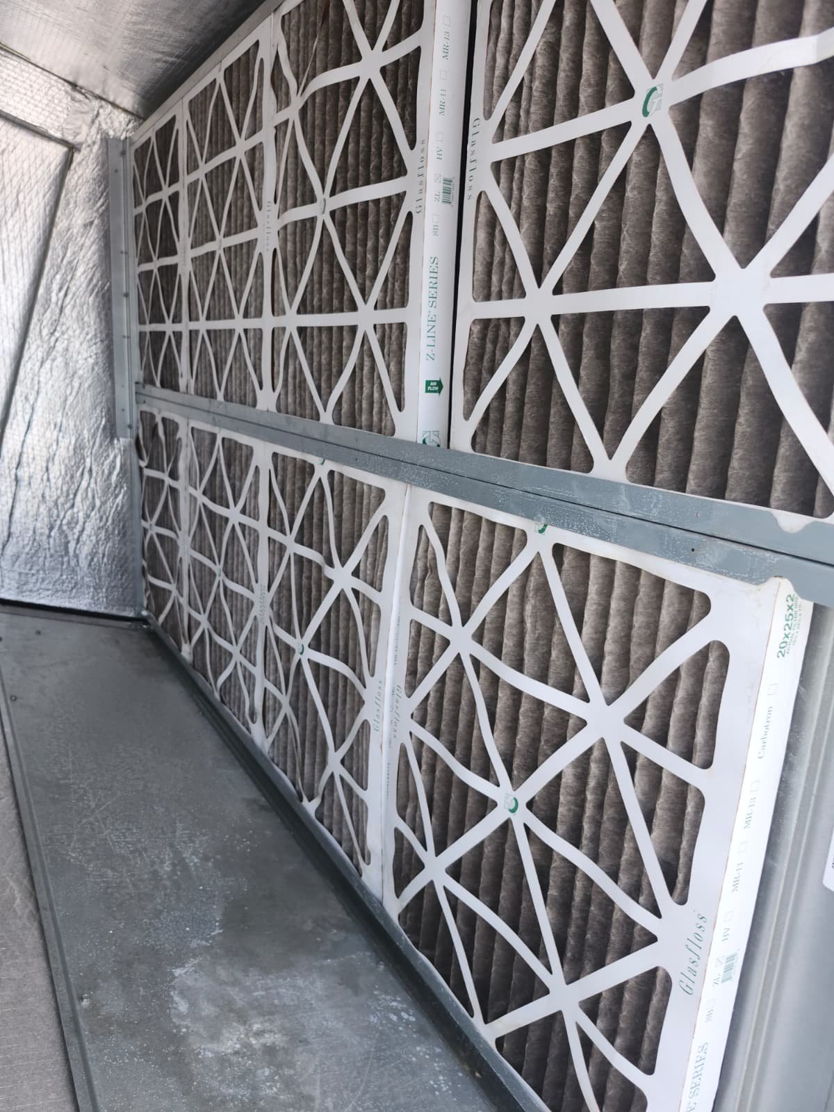 HVAC system inspection during maintenance visit in Tampa, FL 33634