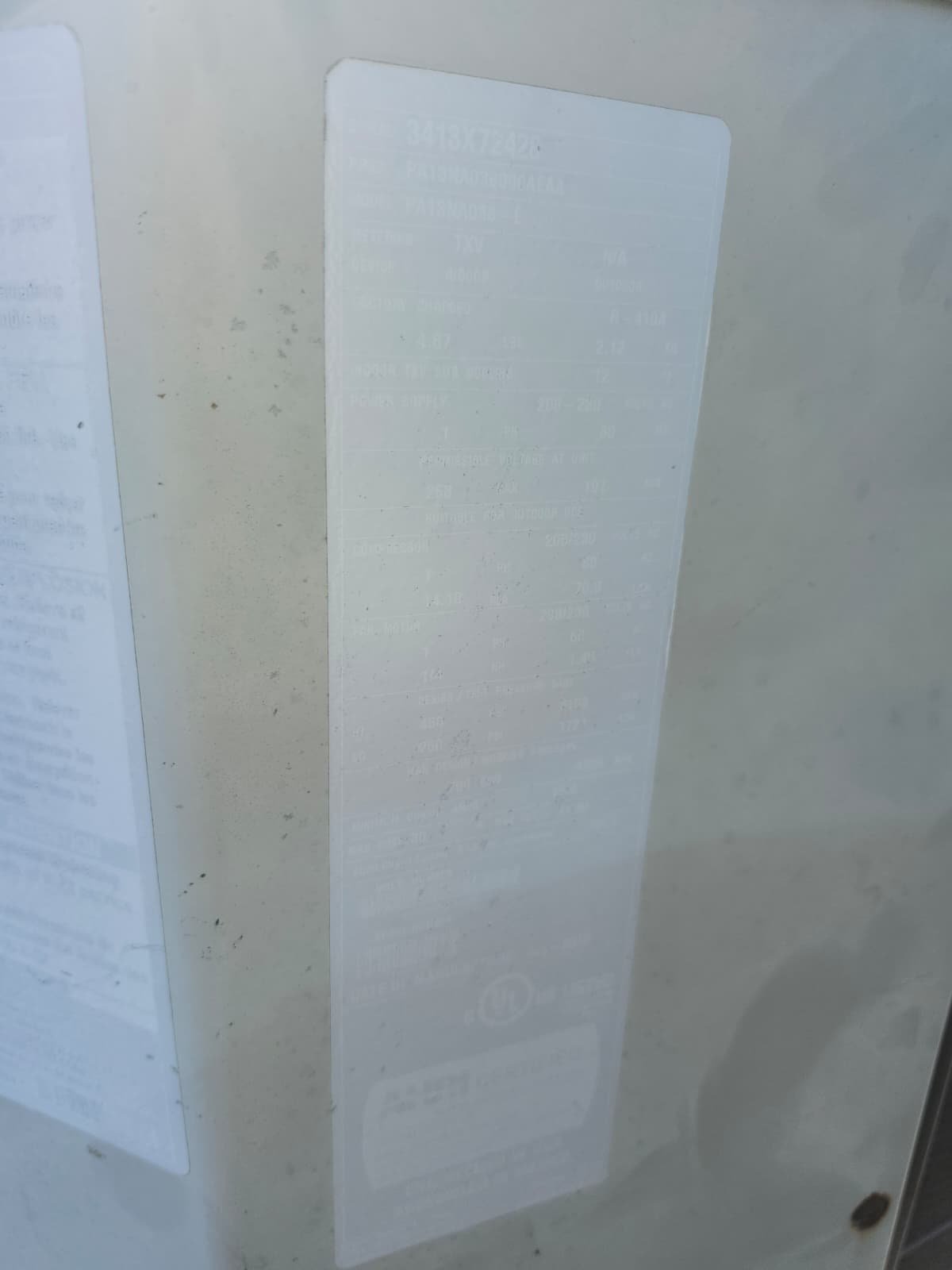 Roof-mounted condenser coil condition documented in Tampa, FL 33634 maintenance