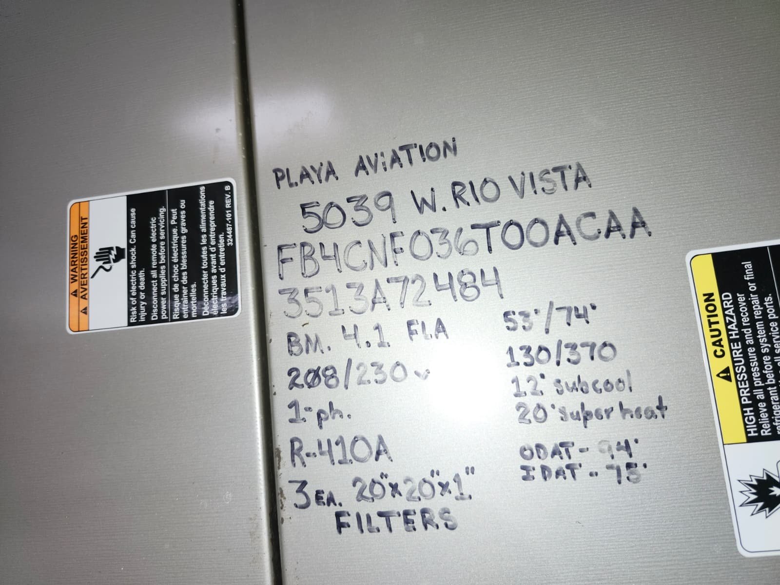 Aging commercial HVAC unit evaluated for replacement in Tampa, FL 33634