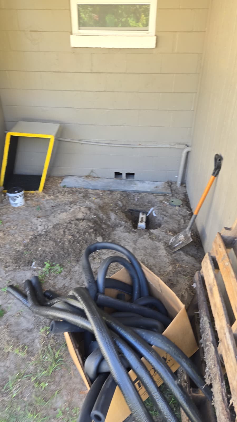 Technician assessing obstructed drain line for snaking in Seffner, FL 33584