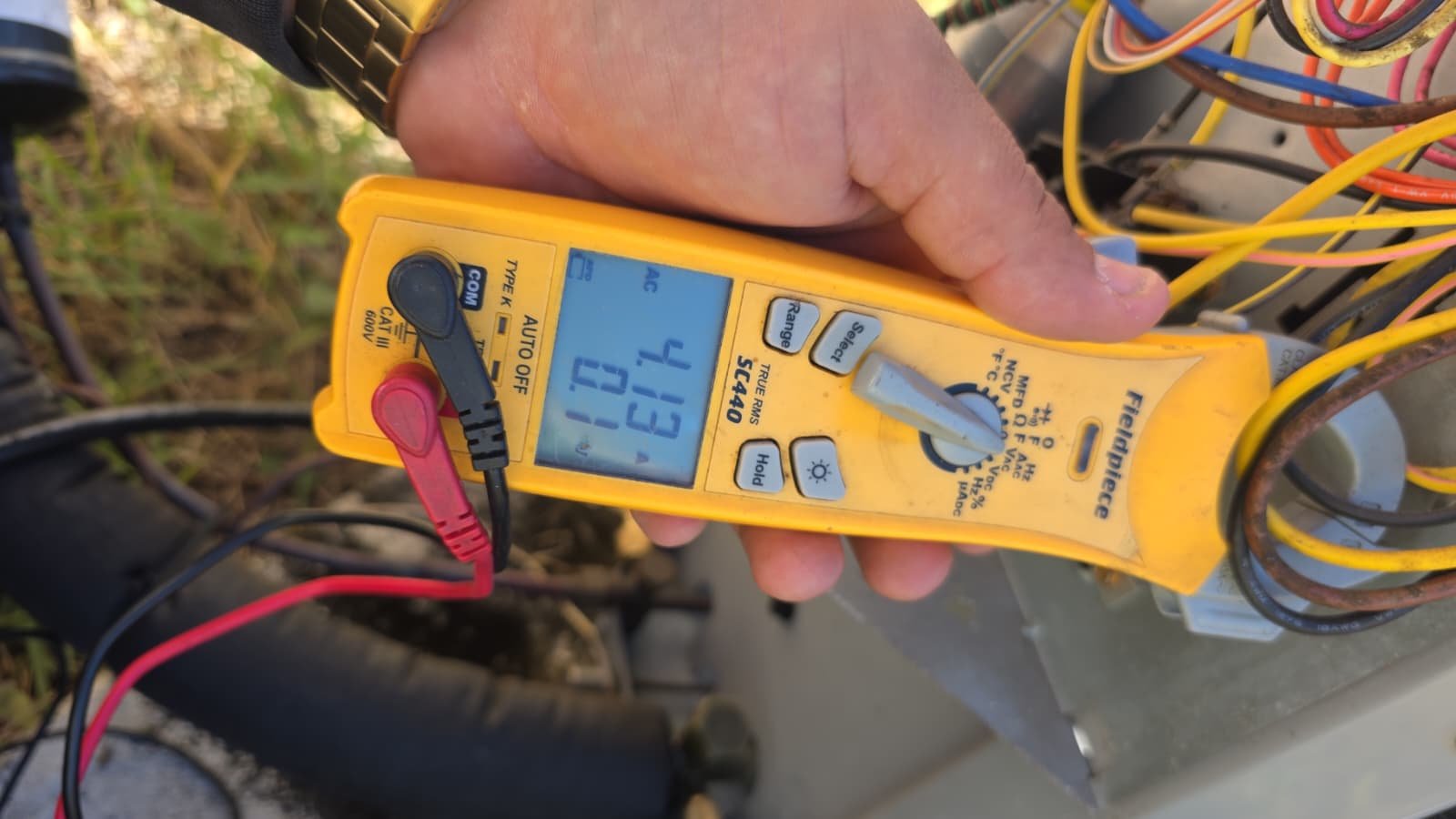 HVAC condenser coil rinsed as part of AC tune-up in Riverview, FL 33578