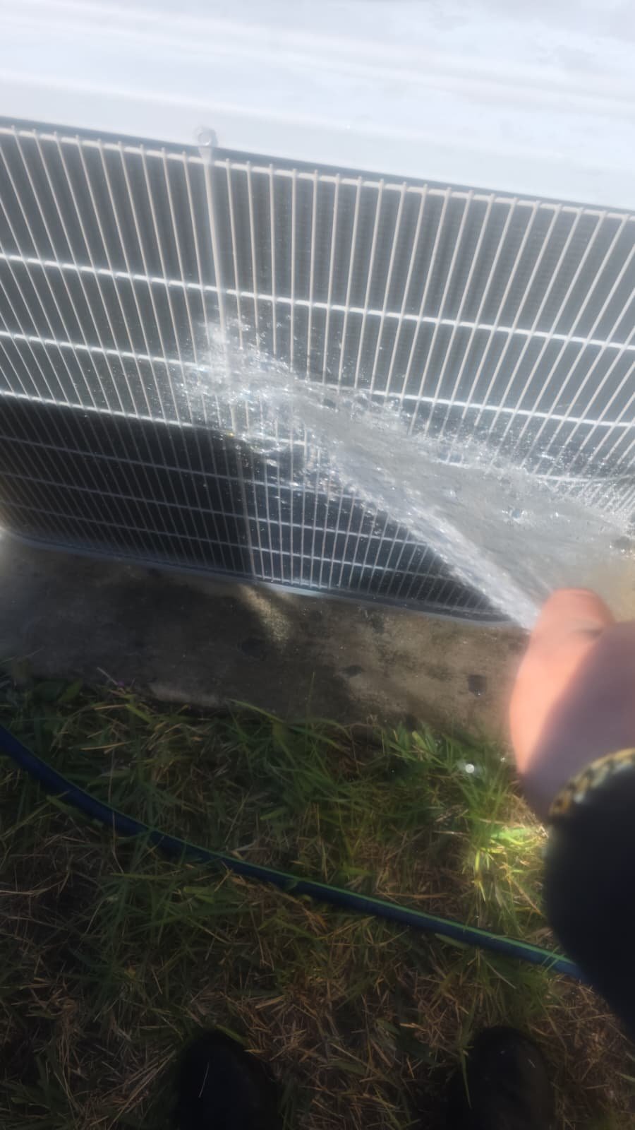 Outdoor air conditioning unit serviced for condenser cleaning in Riverview, FL 33578