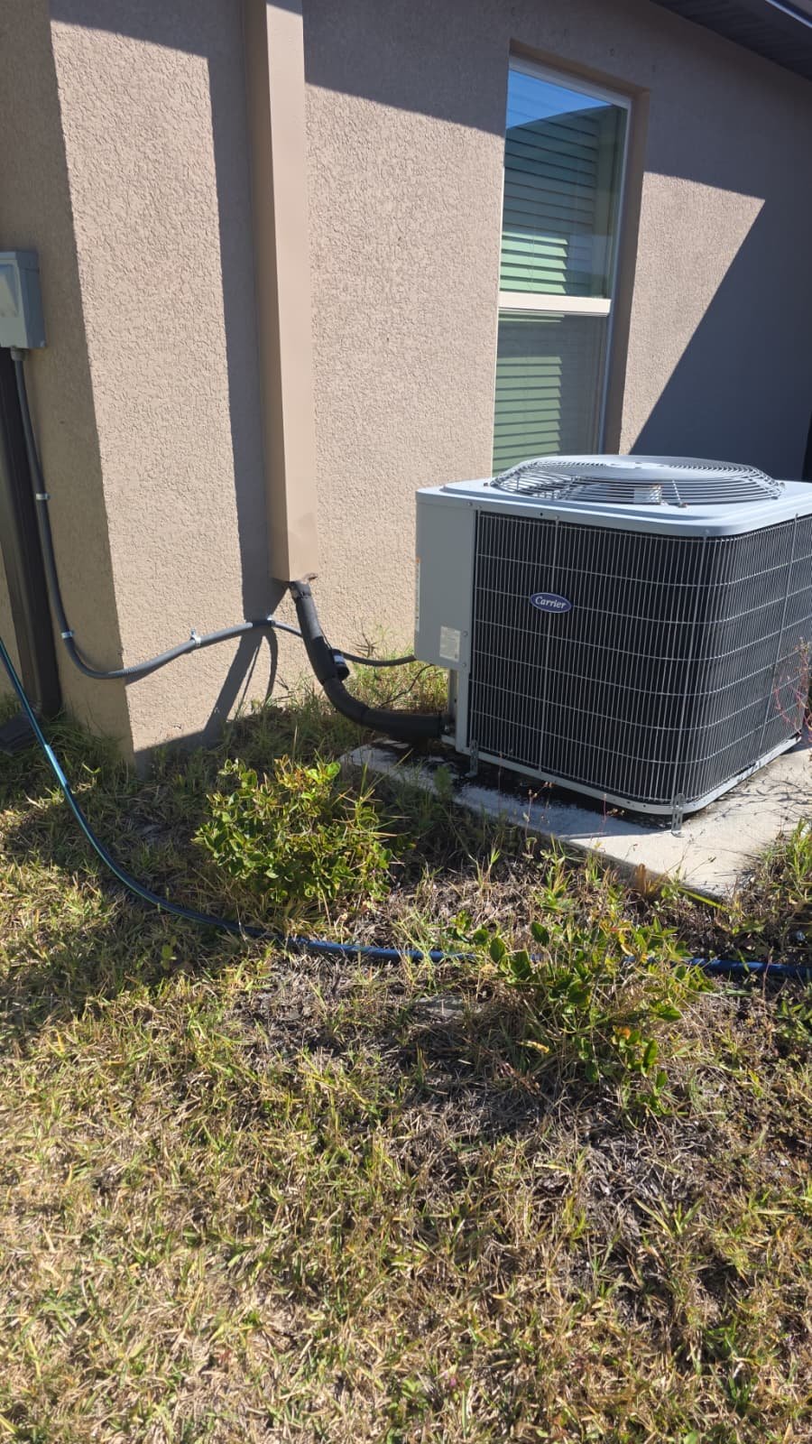 Condenser cleaning during AC maintenance in Riverview, FL 33578
