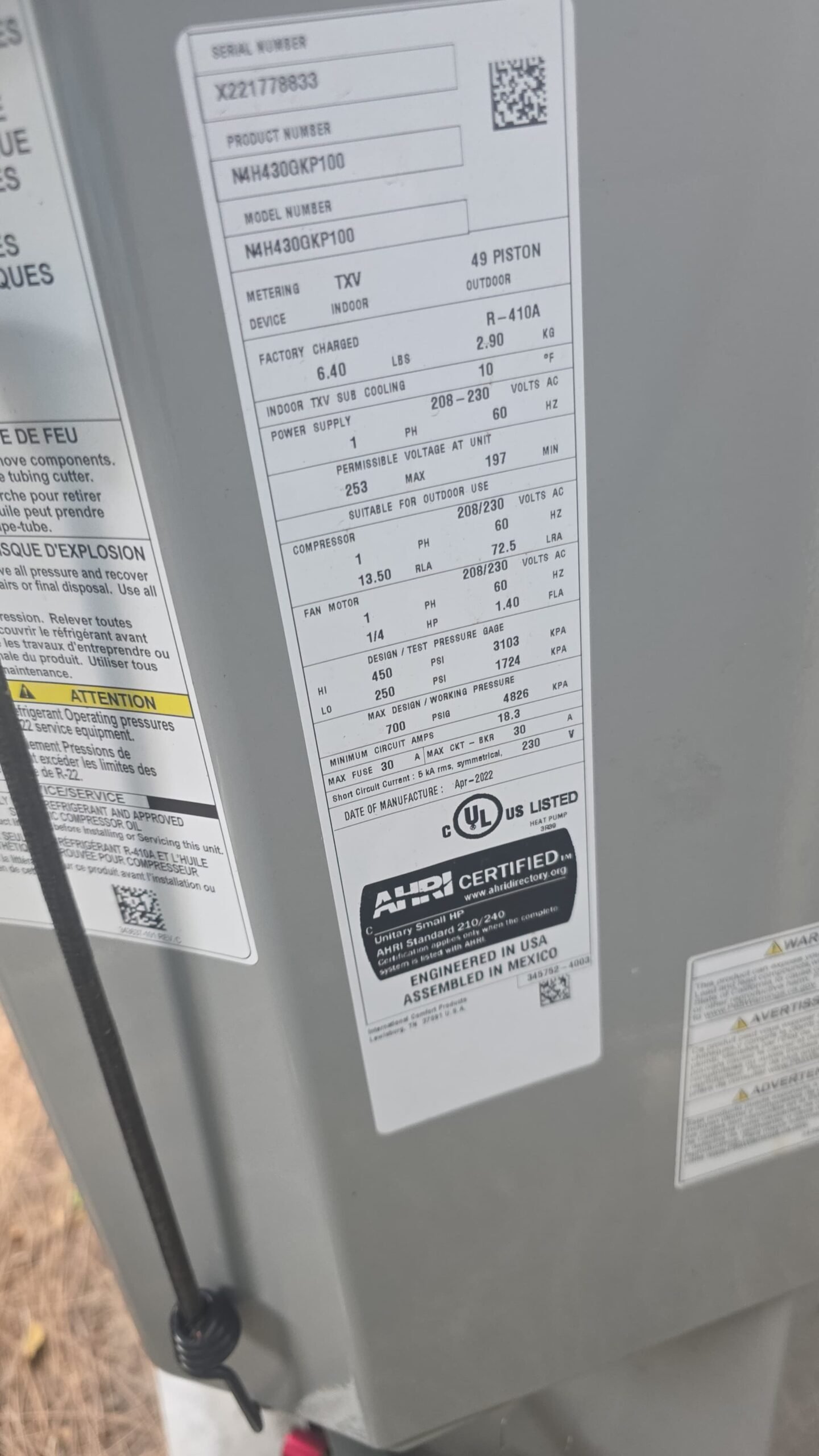 Outdoor AC unit cleaning as part of HVAC tune-up in Tampa, FL 33619