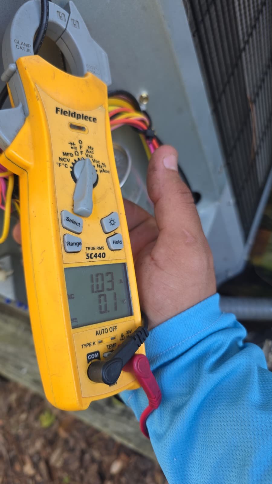 HVAC blower and electrical components inspected during AC tune-up in Tampa, FL 33615