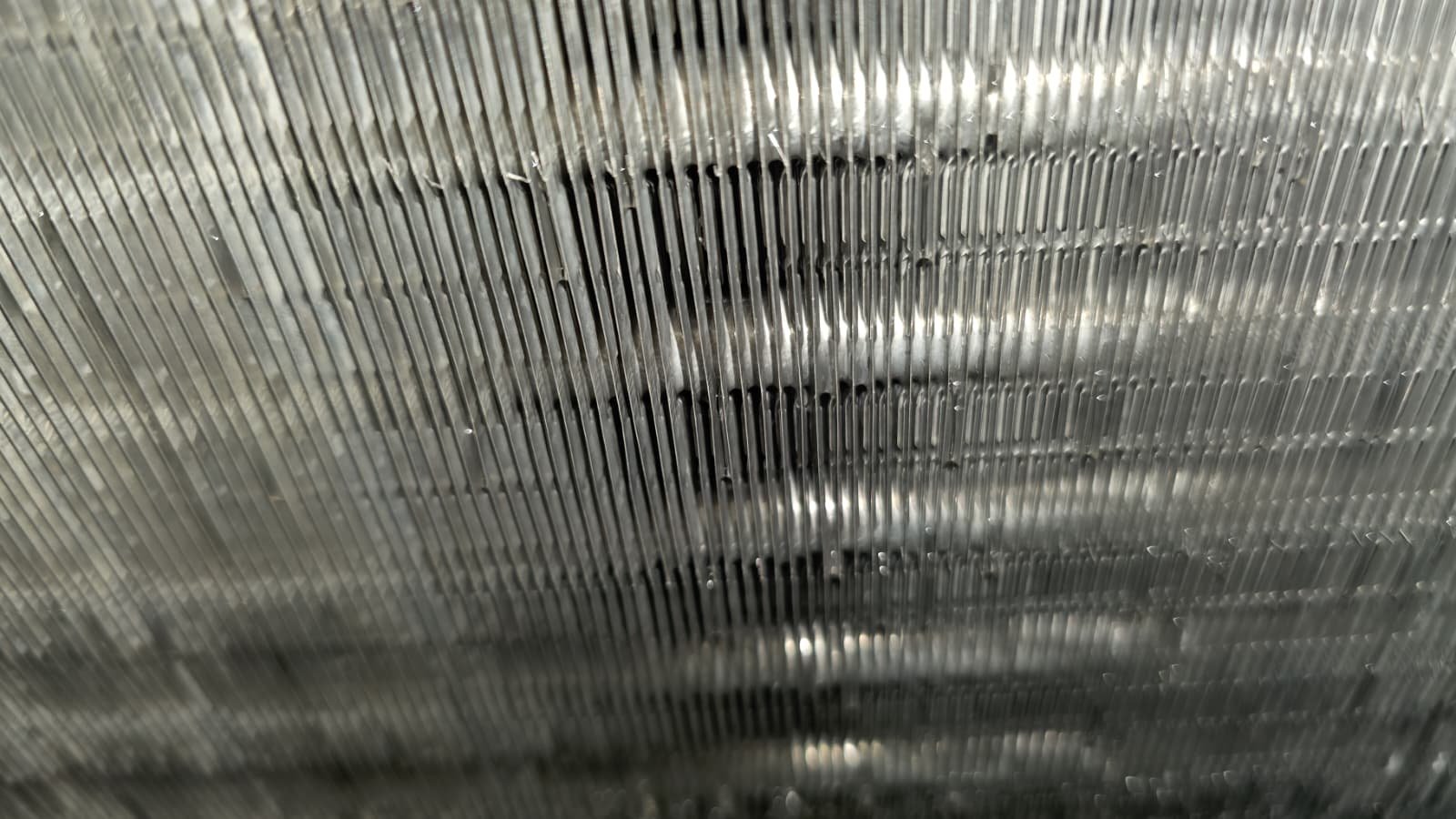 Condenser unit cleaned as part of AC maintenance plan in Tampa, FL 33615