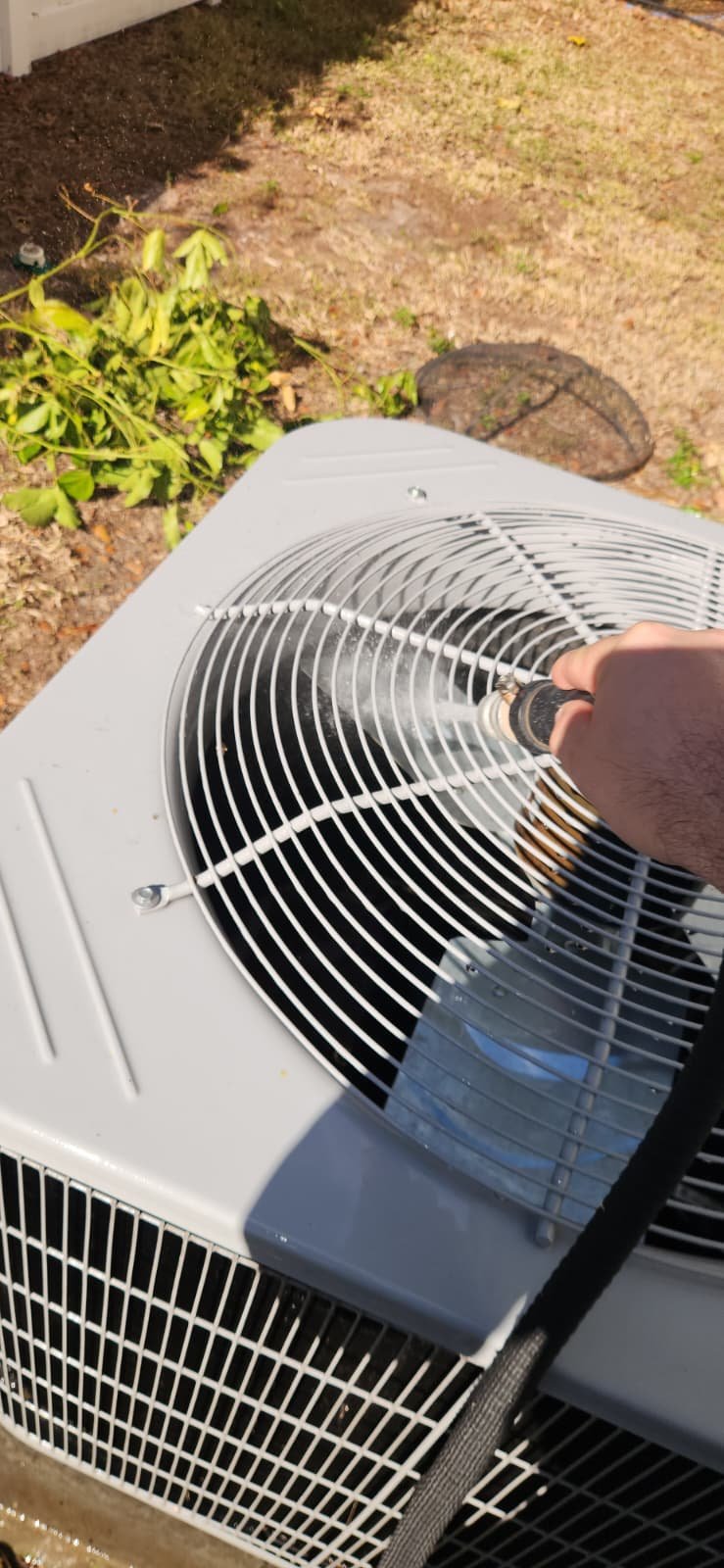 Technician performing maintenance plan services in Tampa, FL 33625
