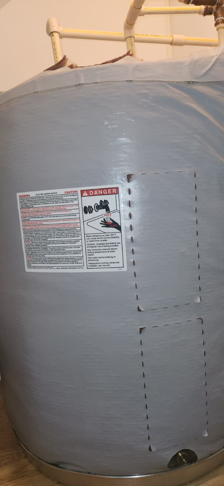 Inspecting water heater TPR valve and anode rod in Tampa, FL 33604