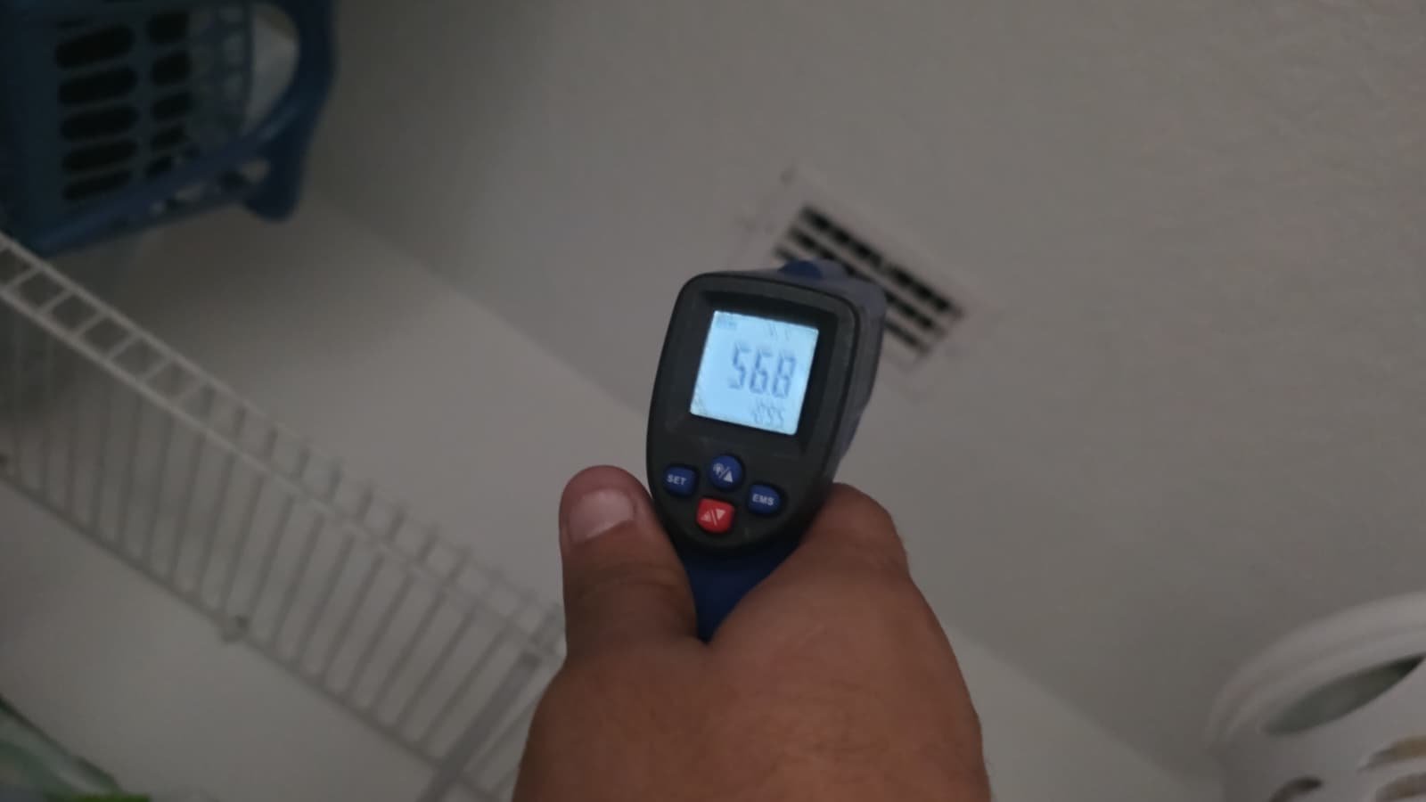 Tampa FL HVAC technician assessing UV light replacement options