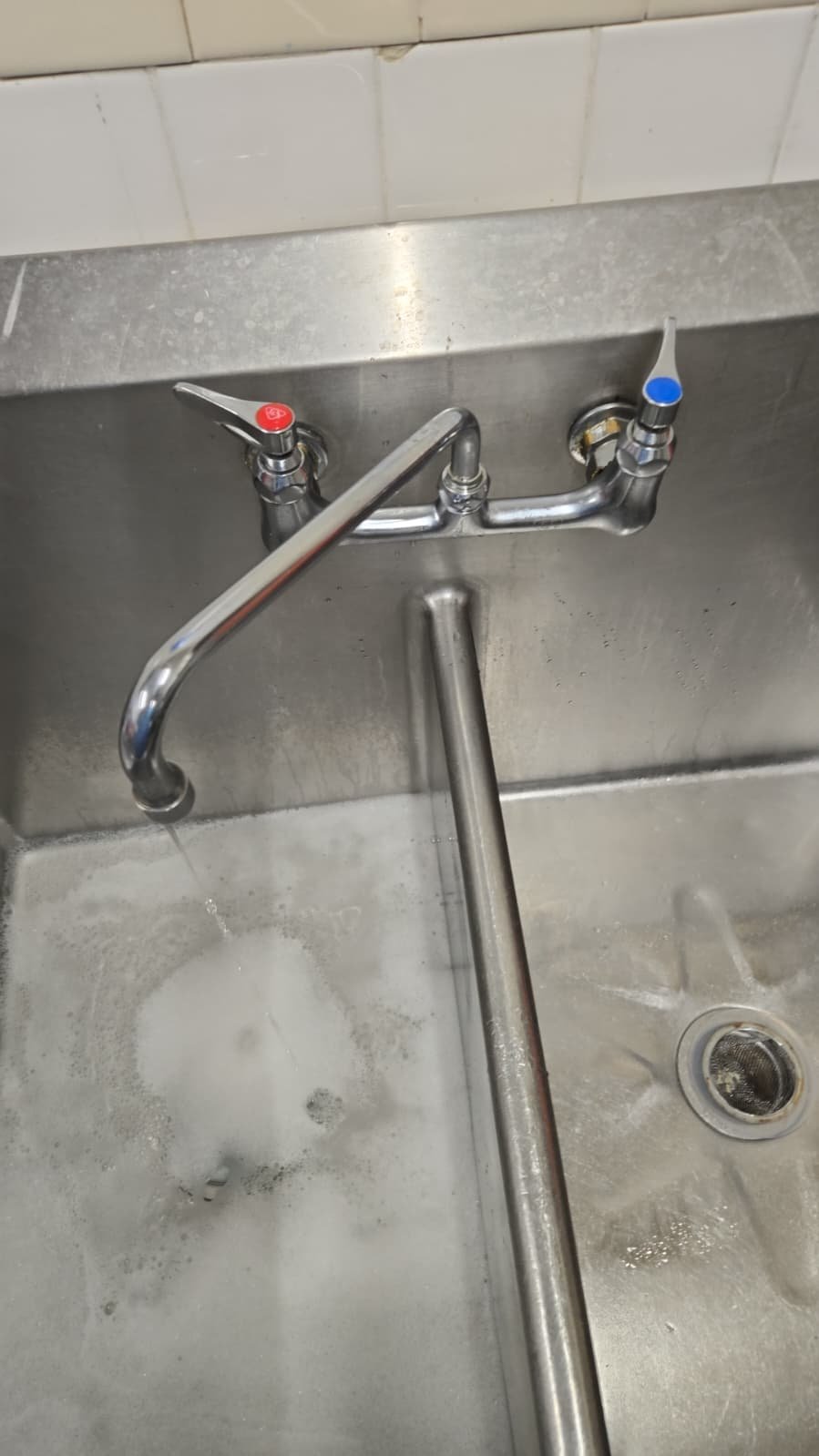 Detail of faucet handles after replacement in Largo, FL 33771