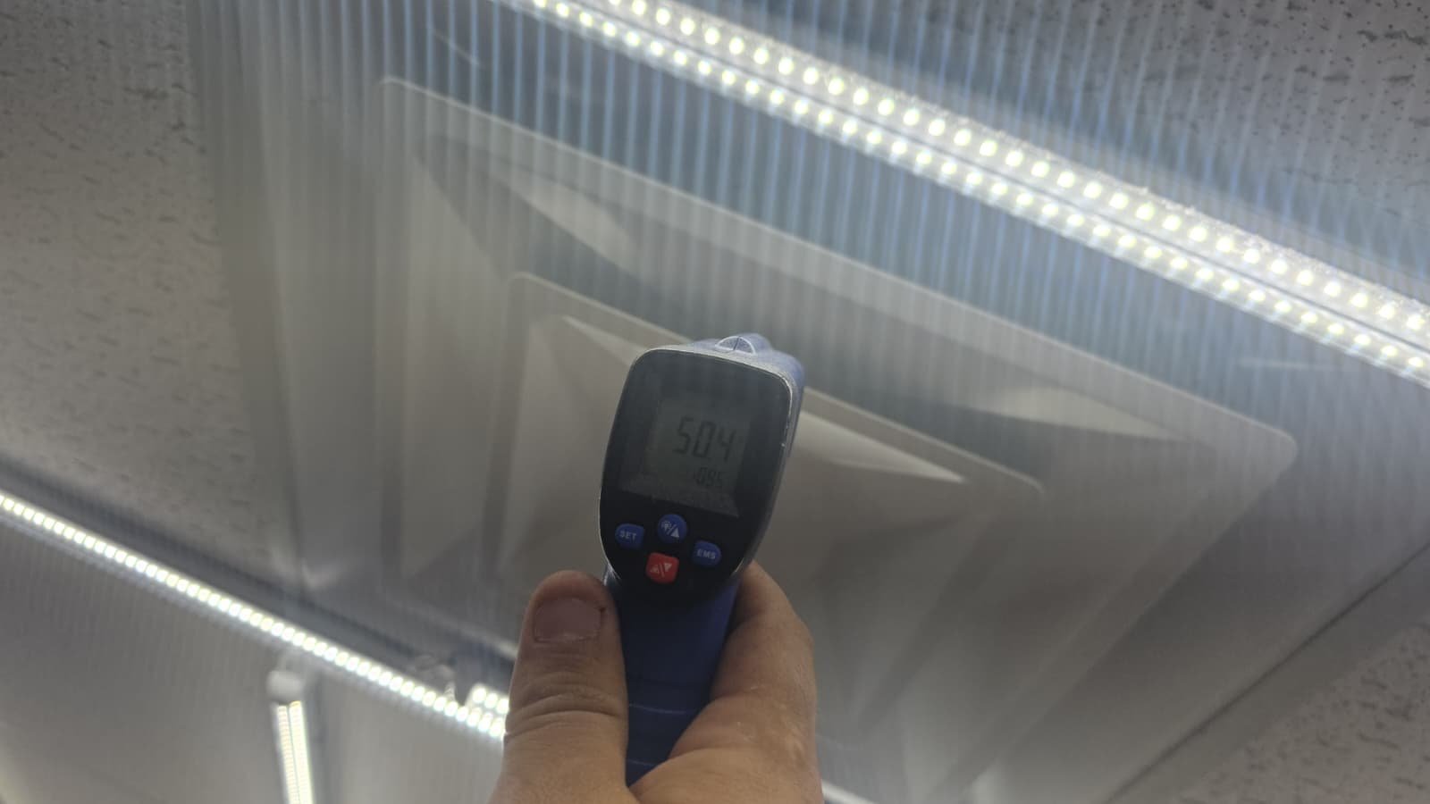 Quarterly HVAC tune-up in Tampa FL 33615 checking system components and wiring