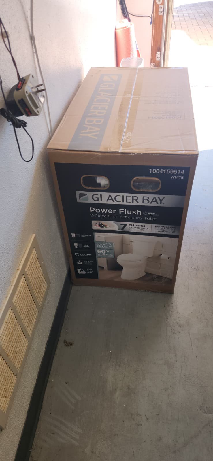 Close-up of new toilet install and water connection in St. Petersburg, FL 33715 home