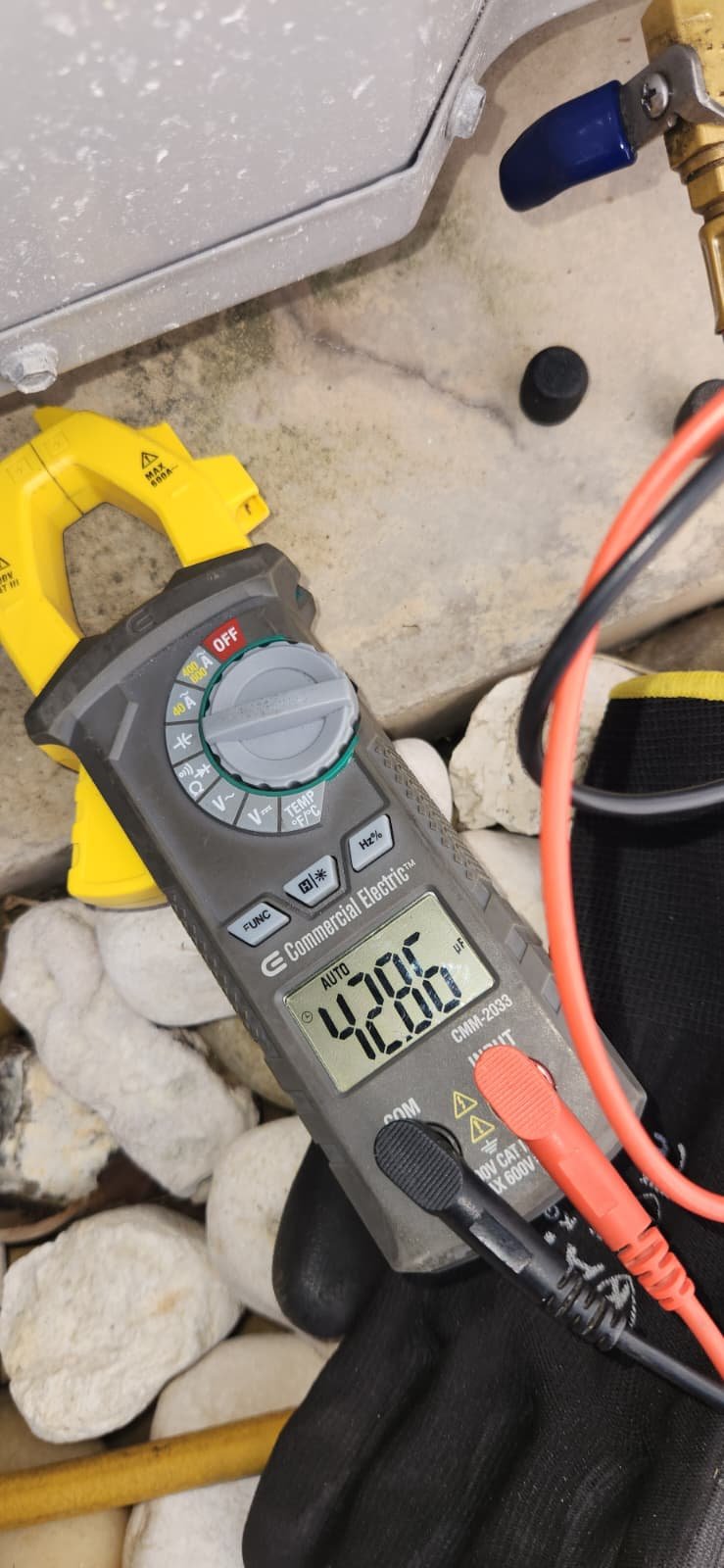 AC tune-up service on residential HVAC system in Tampa, FL 33615