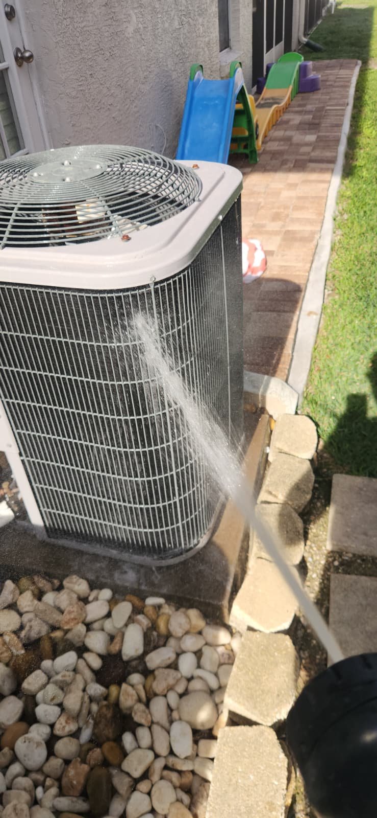 Evaporator coil cleaning during AC tune-up in Tampa, FL 33615 home