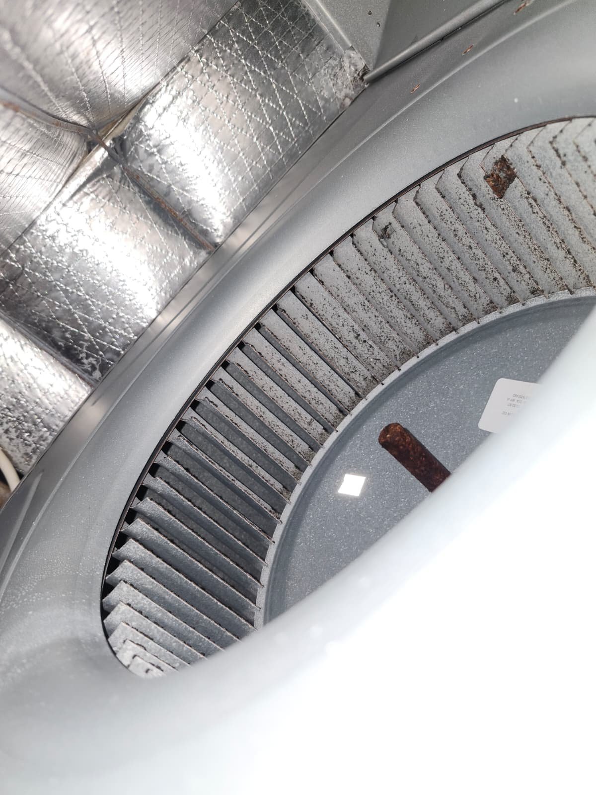 HVAC maintenance in Tampa, FL 33634 evaluating seven-year-old air conditioner