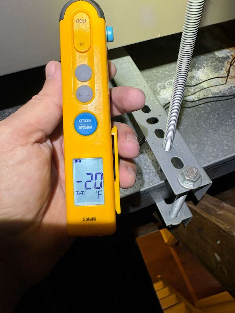 HVAC tune-up in Tampa, FL 33619 inspecting AC components to reduce breakdowns