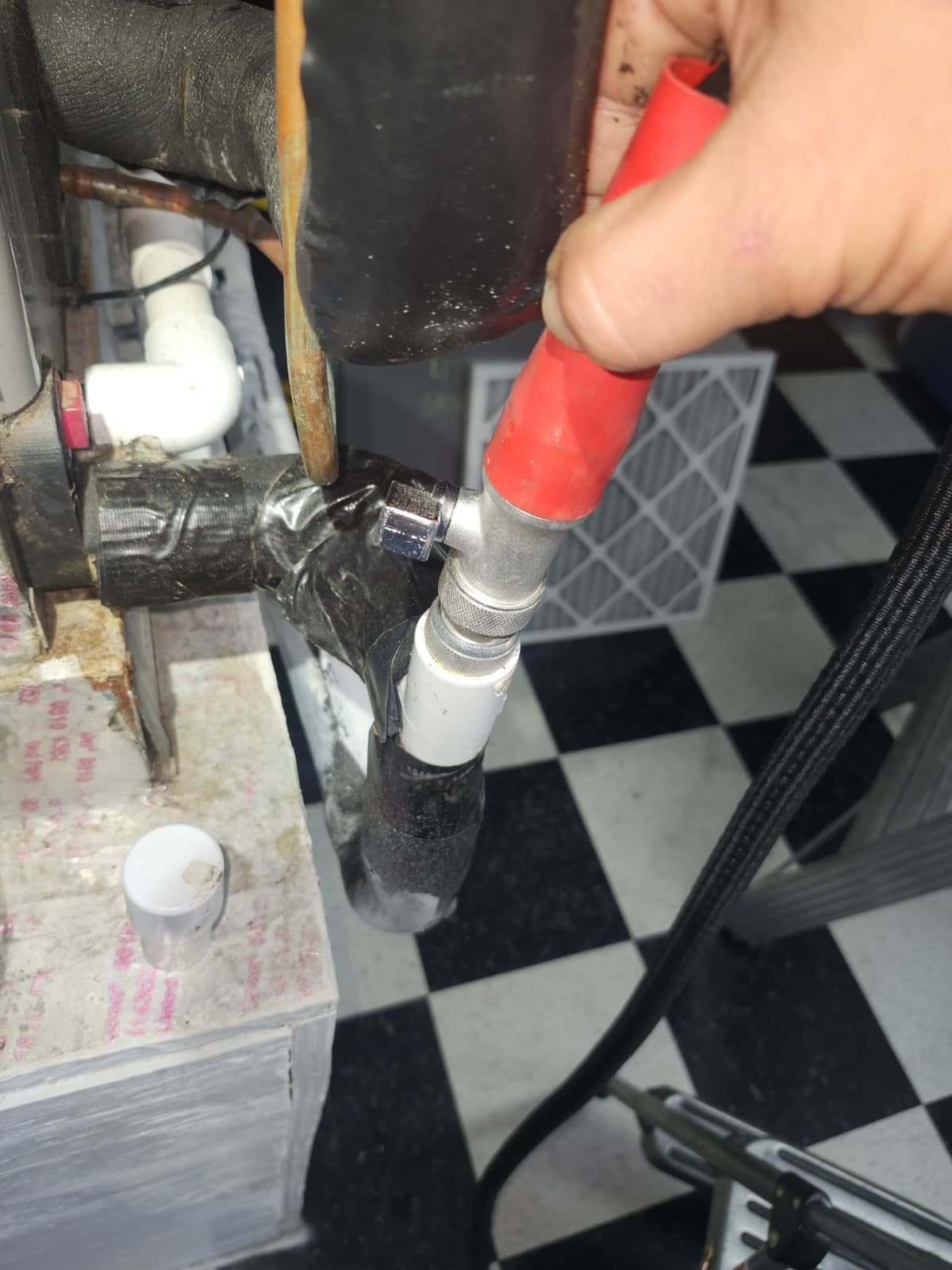 Visible black organic growth on HVAC duct joints in Pinellas Park, FL 33781 home