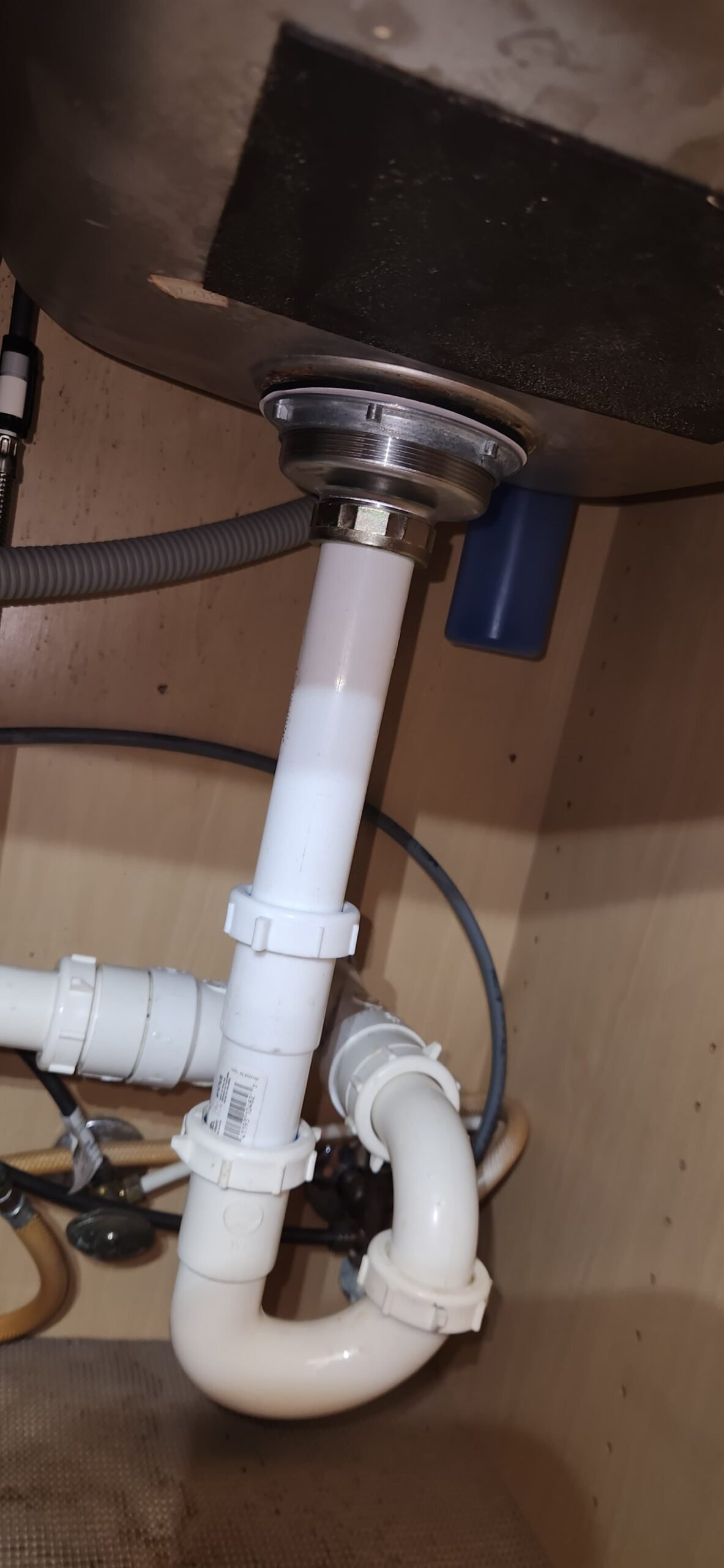 Closeup of new kitchen sink drain strainer install in Tampa, FL 33618