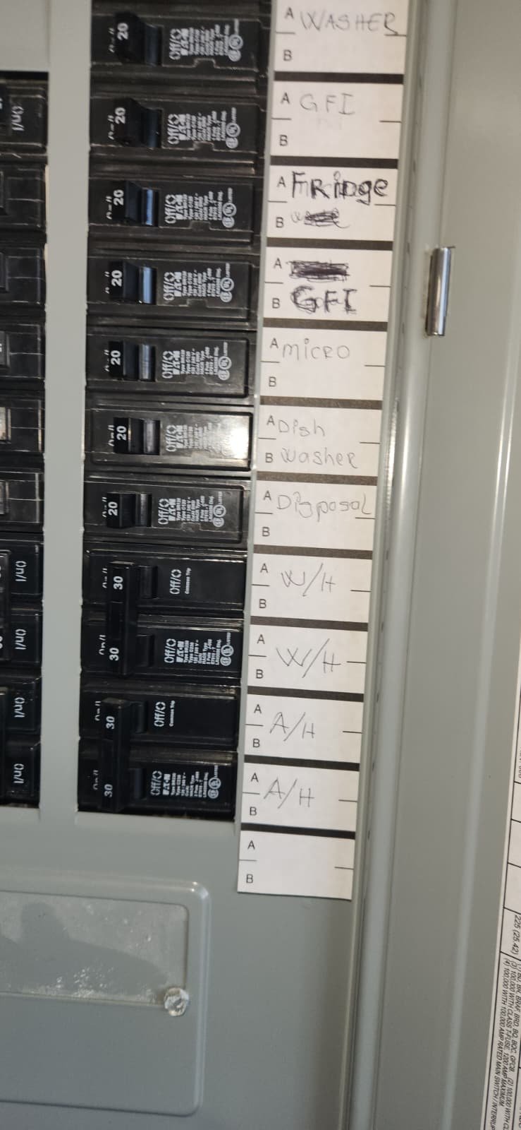 Checking water heater for rust and leaks during inspection in Tampa, FL 33609