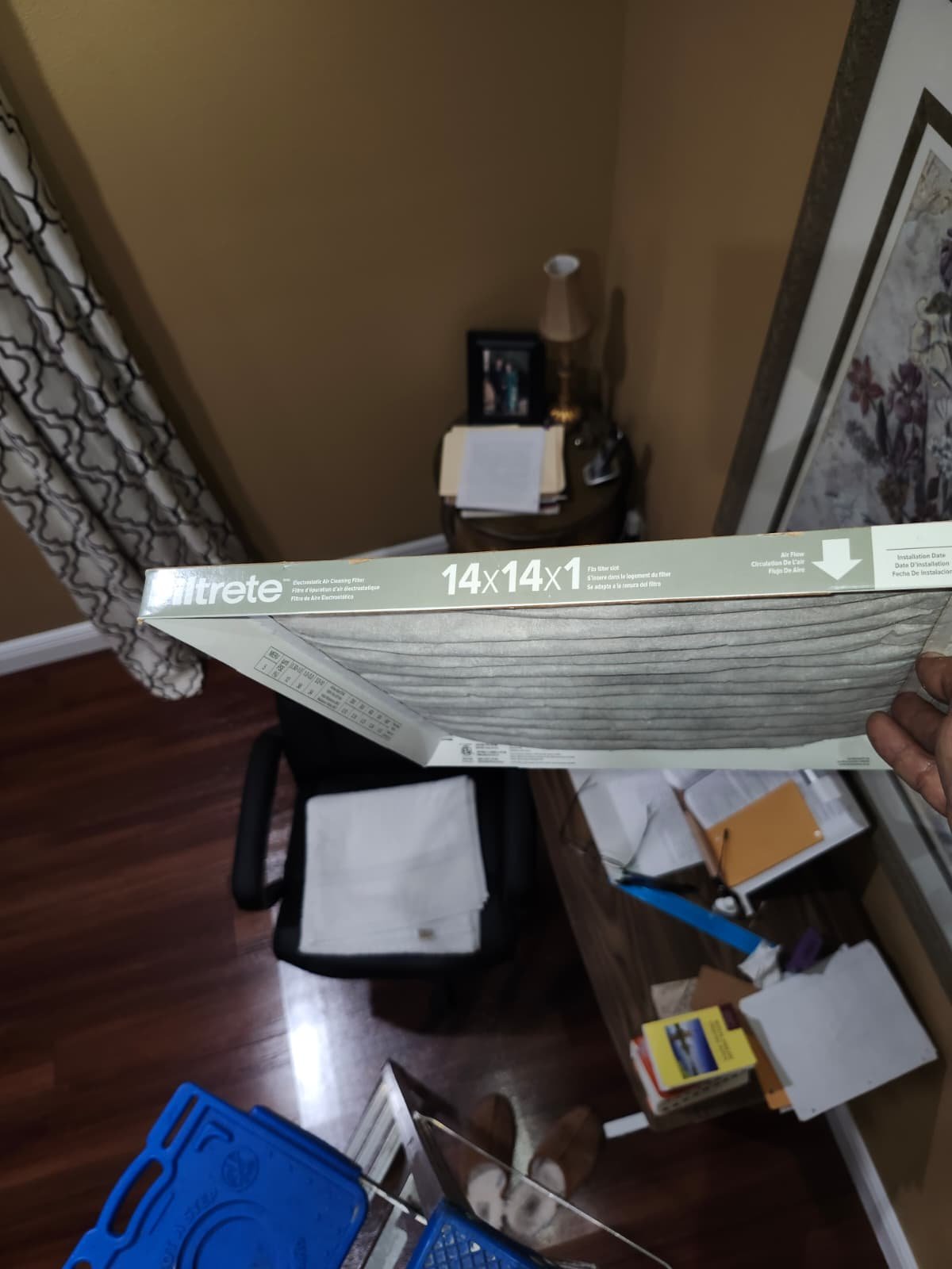 Technician inspecting HVAC zoning system in Lutz, FL 33559 home