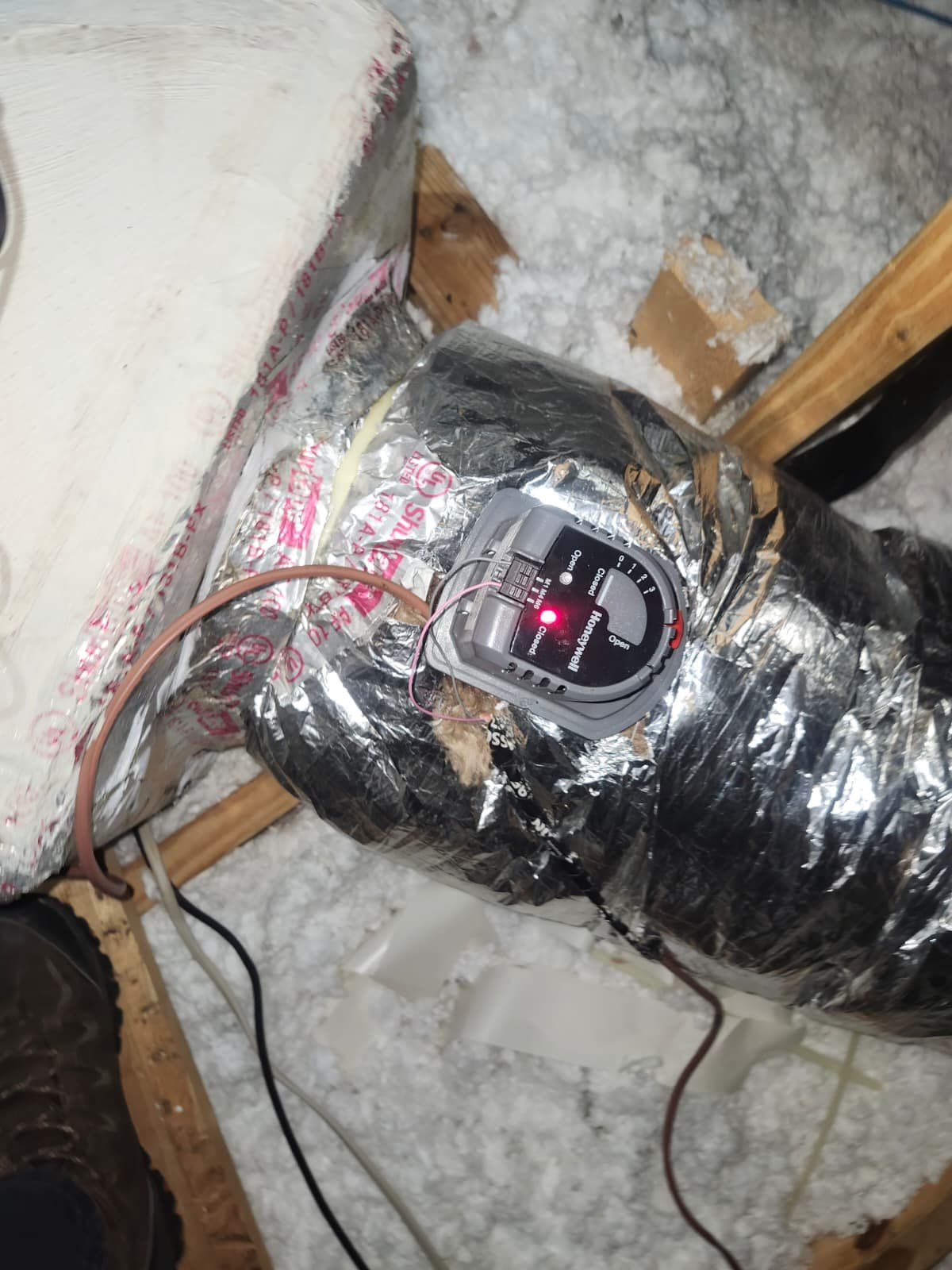 Honeywell zone damper motor replacement in attic system in Lutz, FL 33559