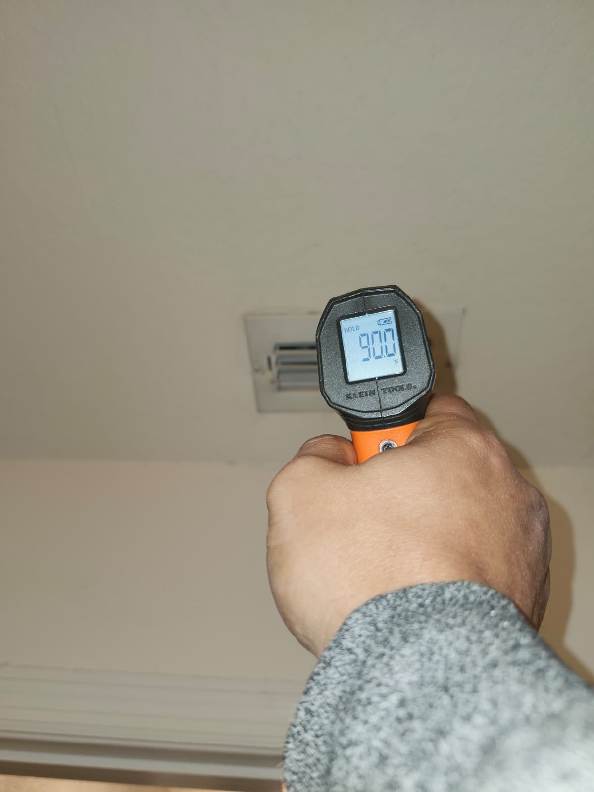 Dirty A/C coil surface showing organic buildup in Odessa, FL 33556 home