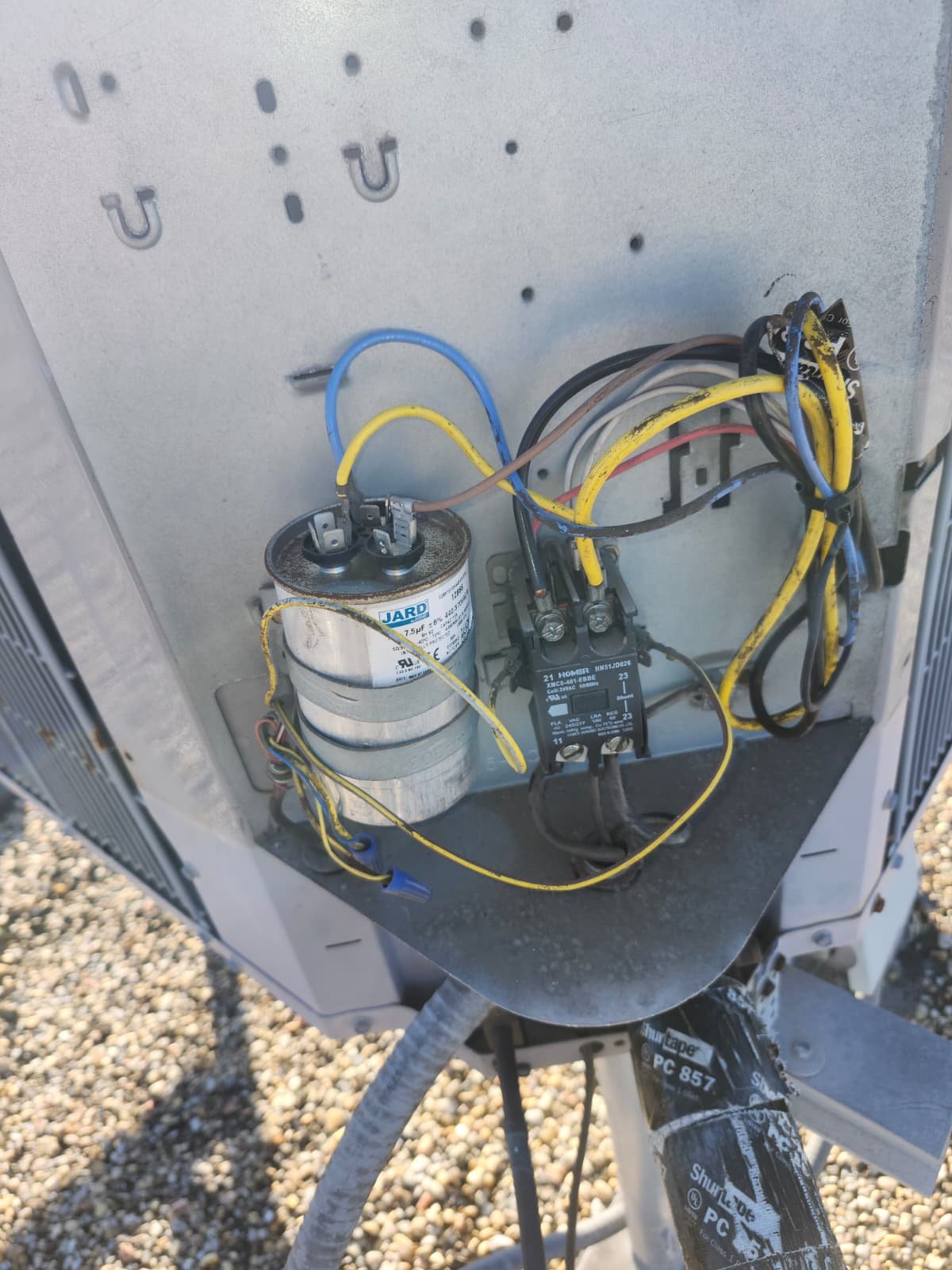 Evaporator coil inspection showing oxidation on Tampa, FL 33634 AC system