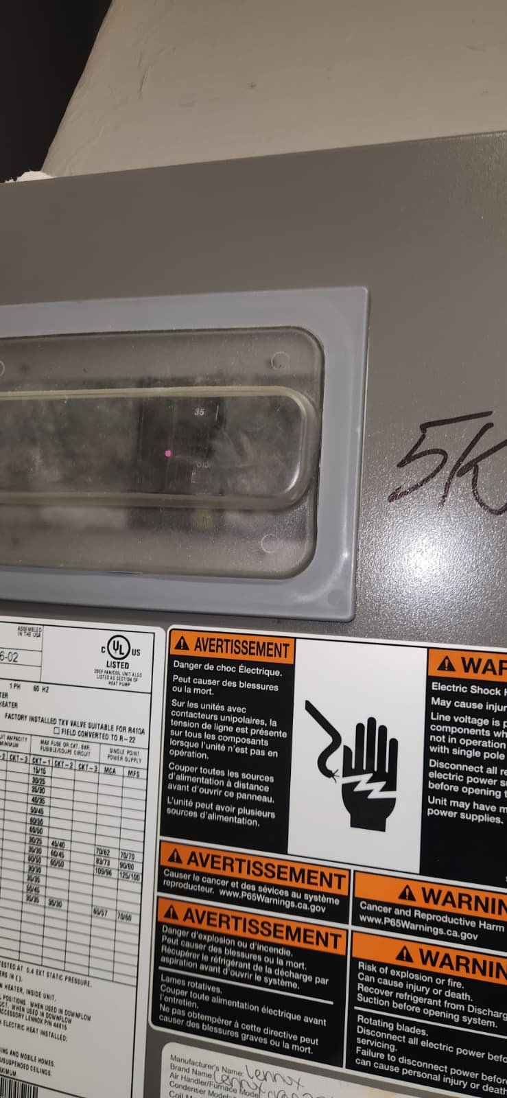 Air conditioning maintenance in Tampa, FL 33634 cleaning condenser coil