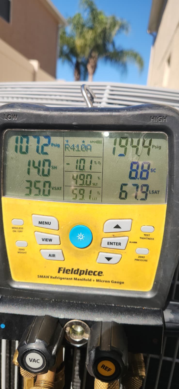 Close-up of installed AC capacitor and disconnect switch in Land O' Lakes, FL 34638